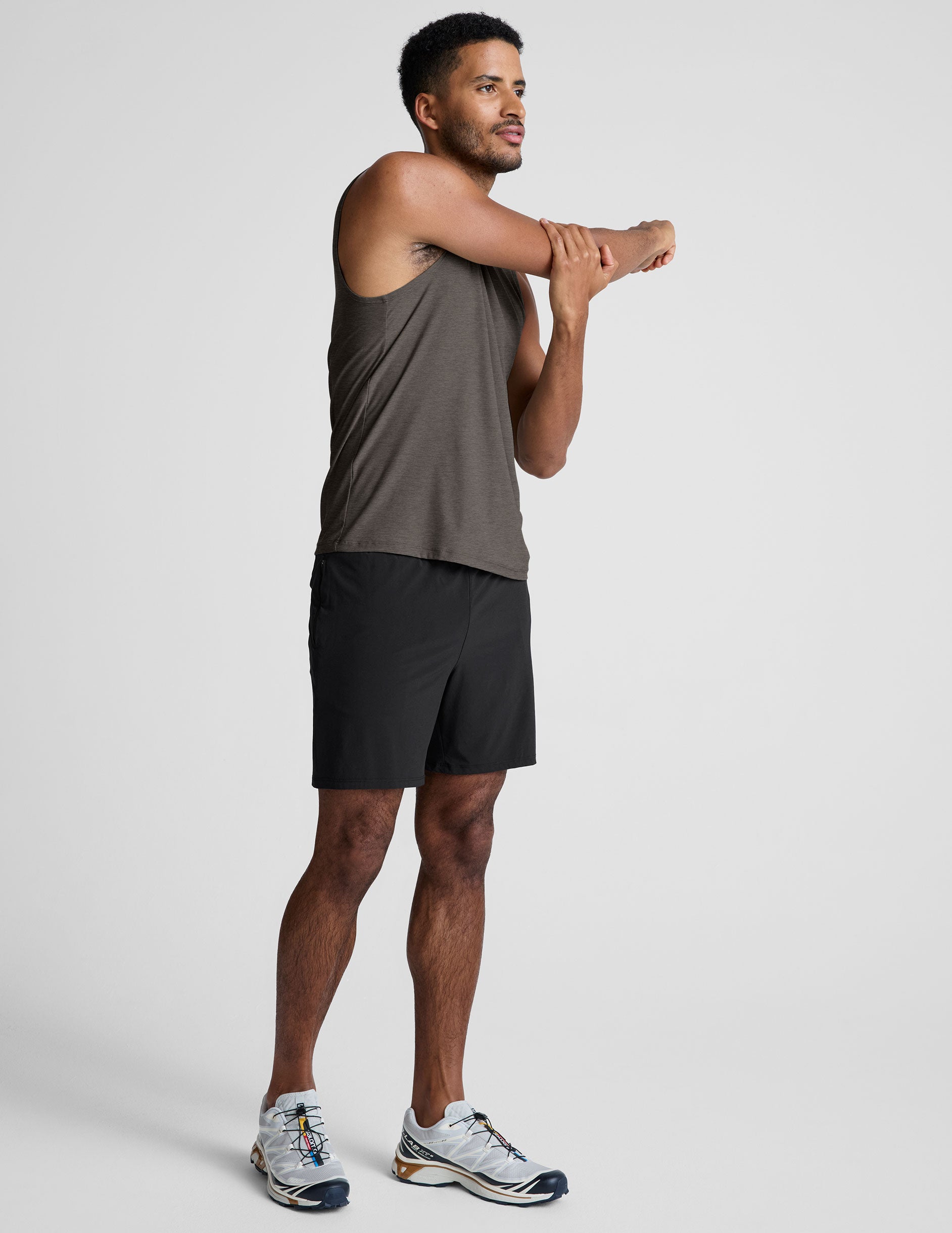 brown sleeveless mens muscle tank top with a ribbed collar.