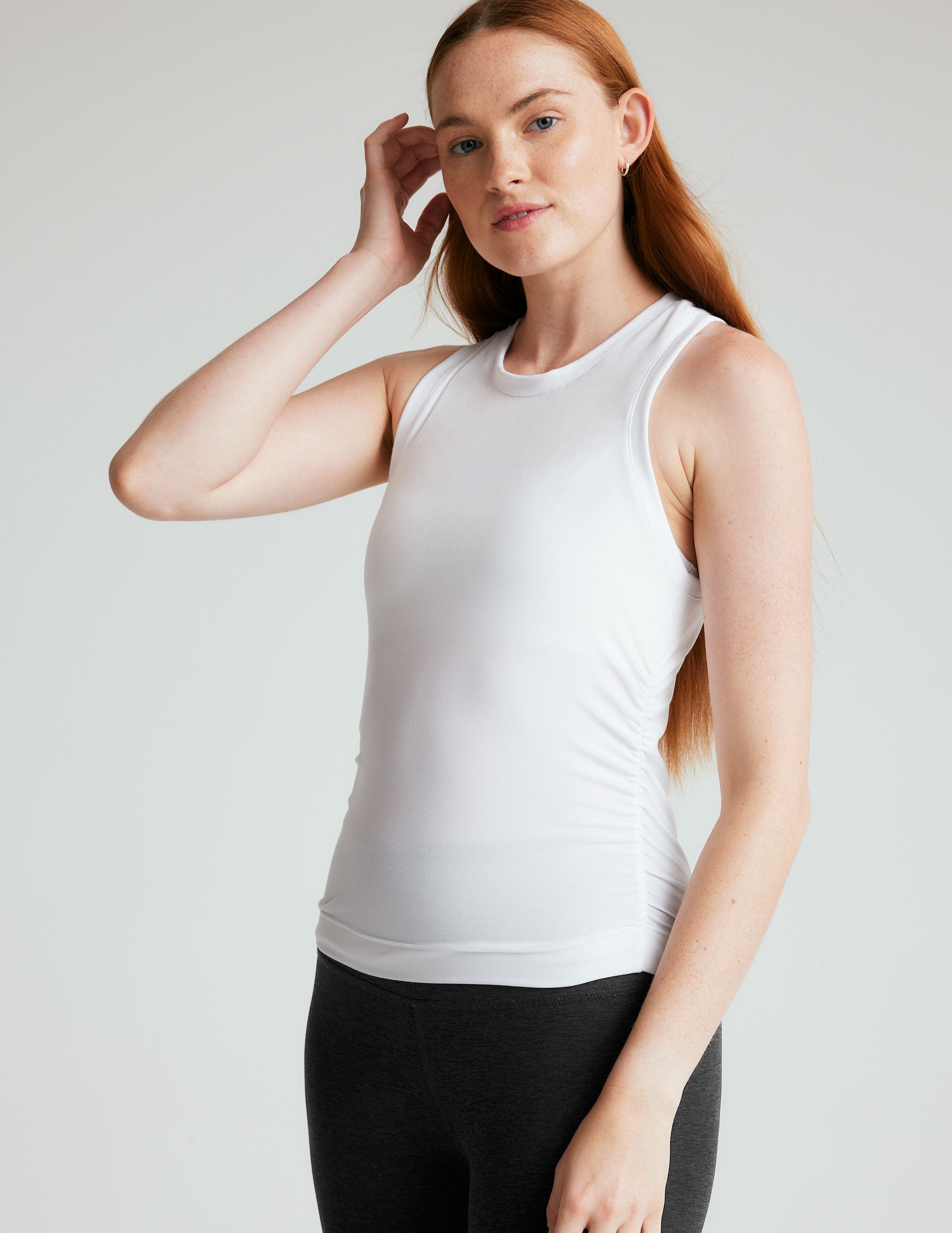 white tank with shirring details down the sides.