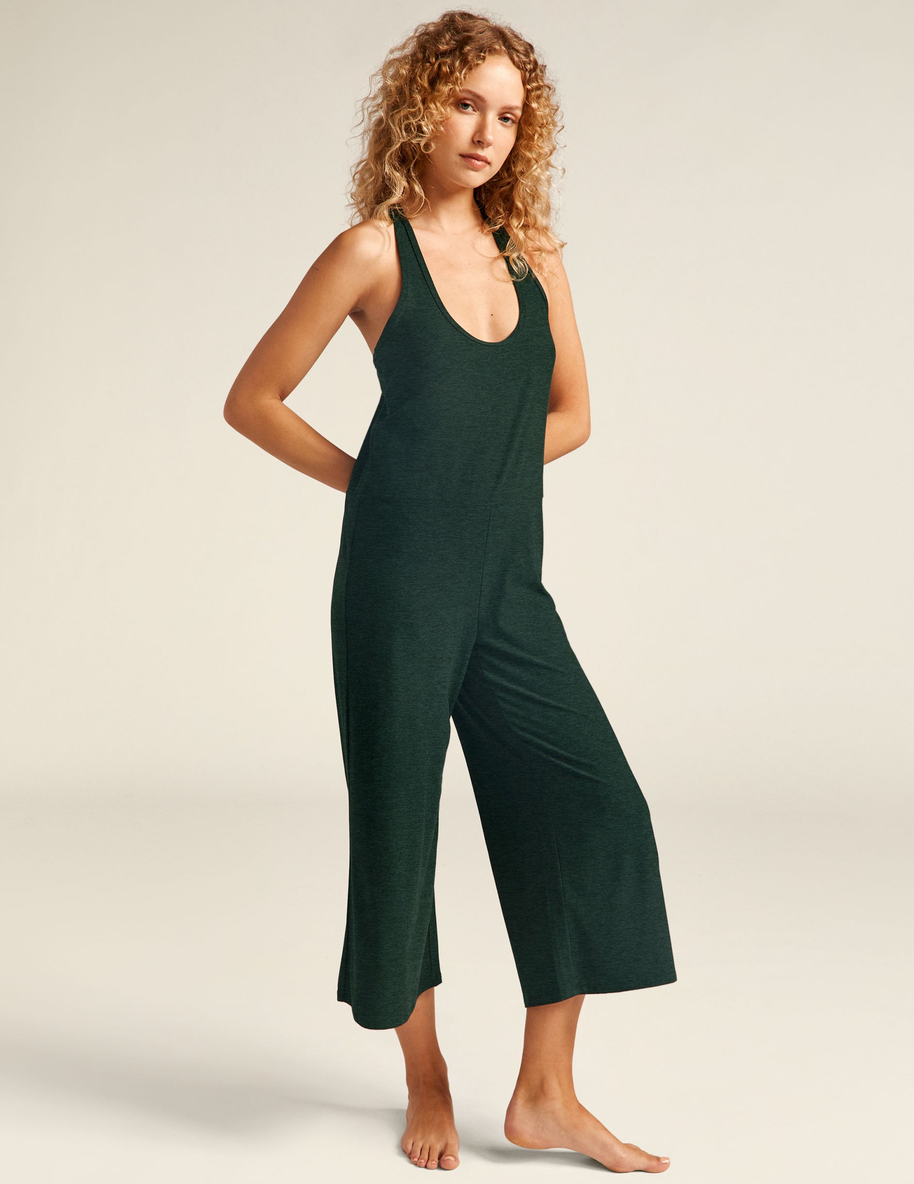green lightweight, relaxed fit racerback jumpsuit. 