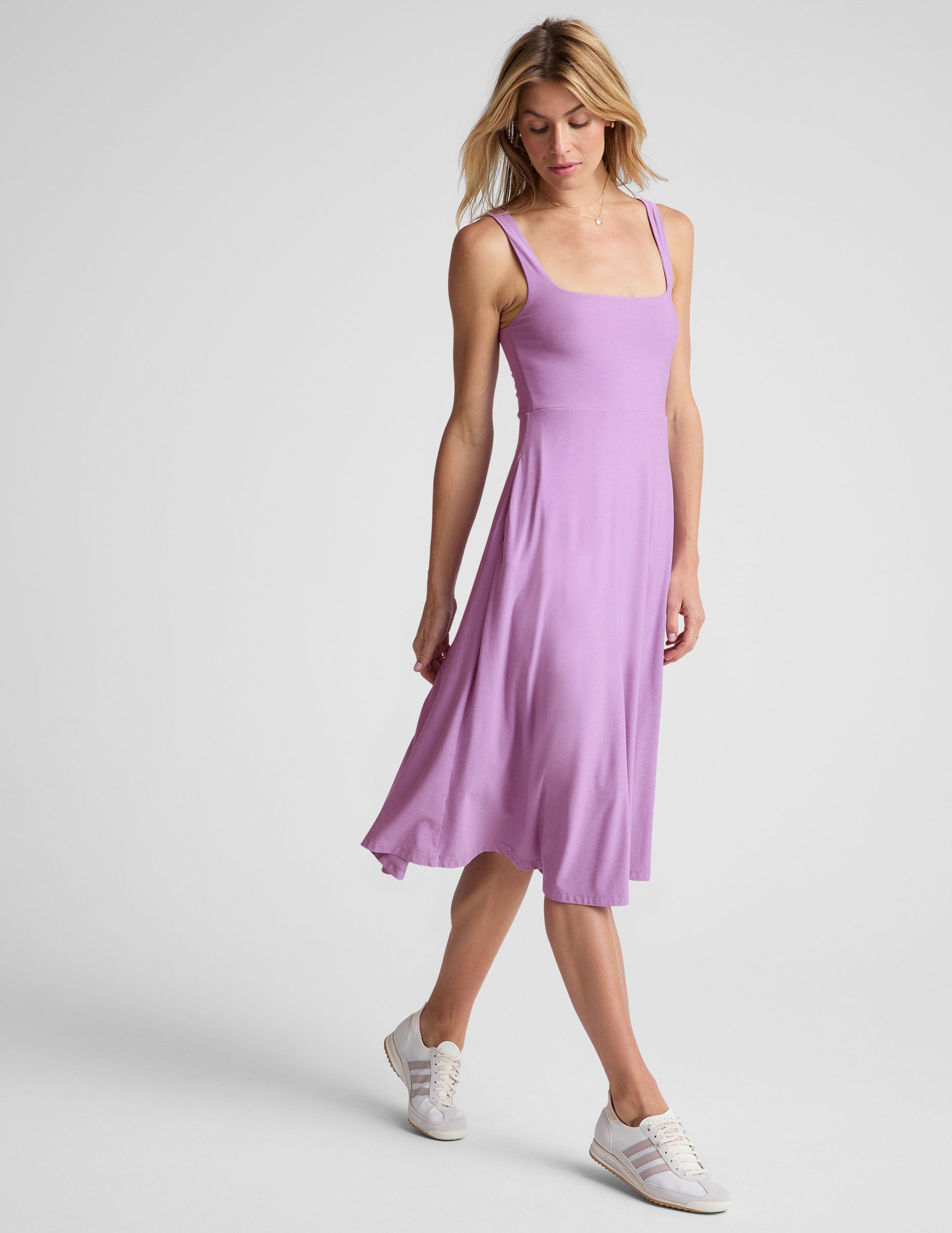 purple midi length square neck dress. 