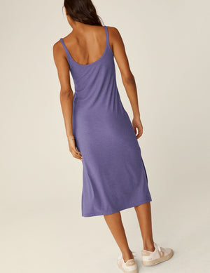 purple scoop neck midi dress with front side slit on each side. 