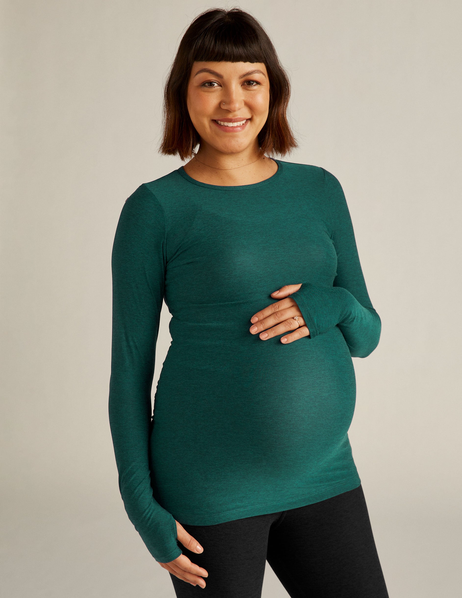 green maternity long sleeve pullover shirt.