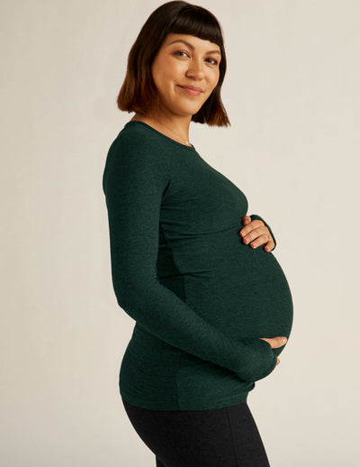 green maternity long sleeve, scoop neck top.