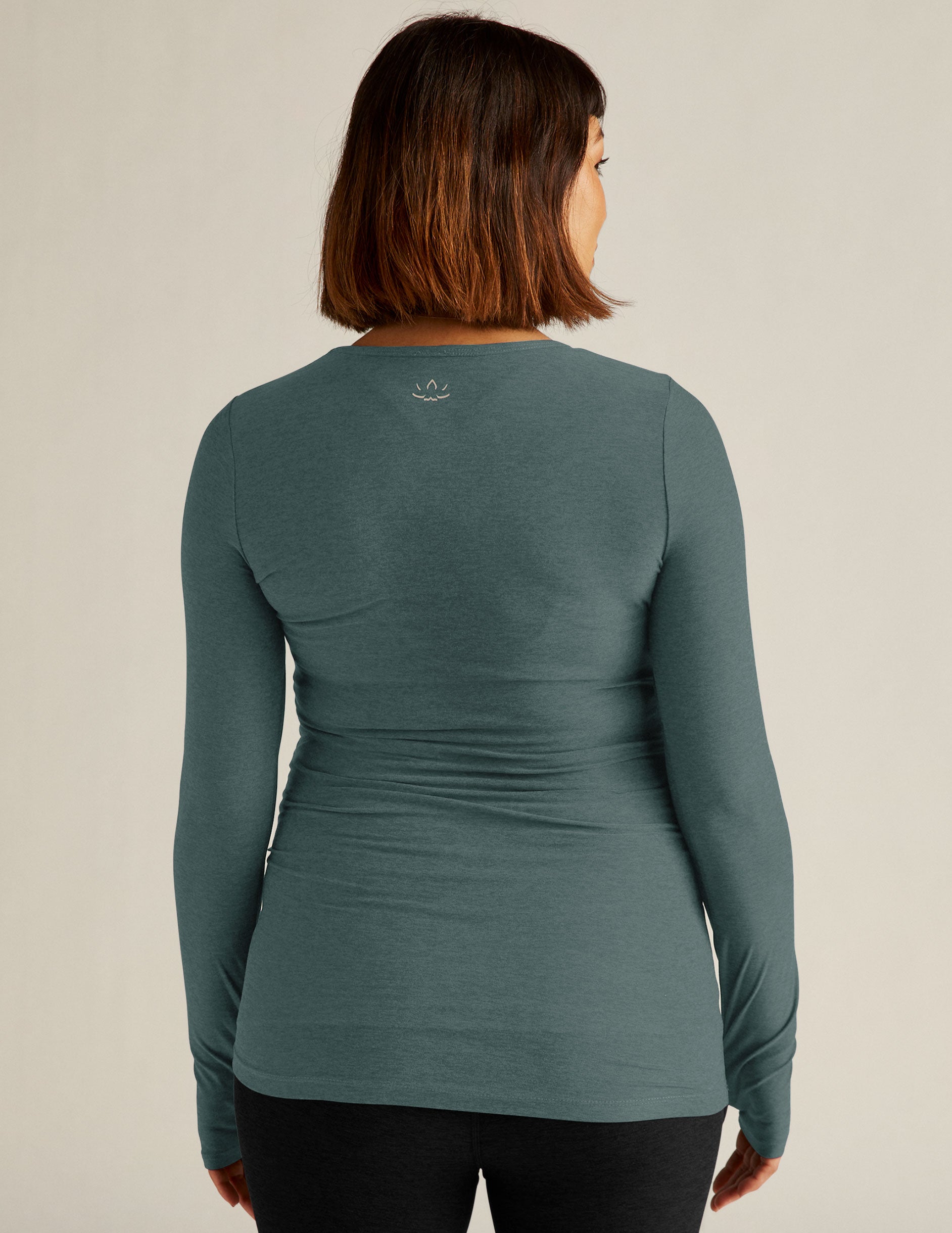 blue long sleeve crew neck maternity top with thumb holes. 