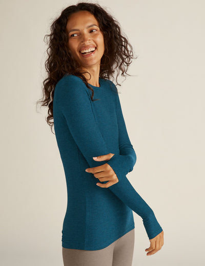 blue long sleeve pullover with thumb holes. 