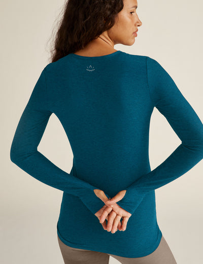 blue long sleeve pullover with thumb holes. 