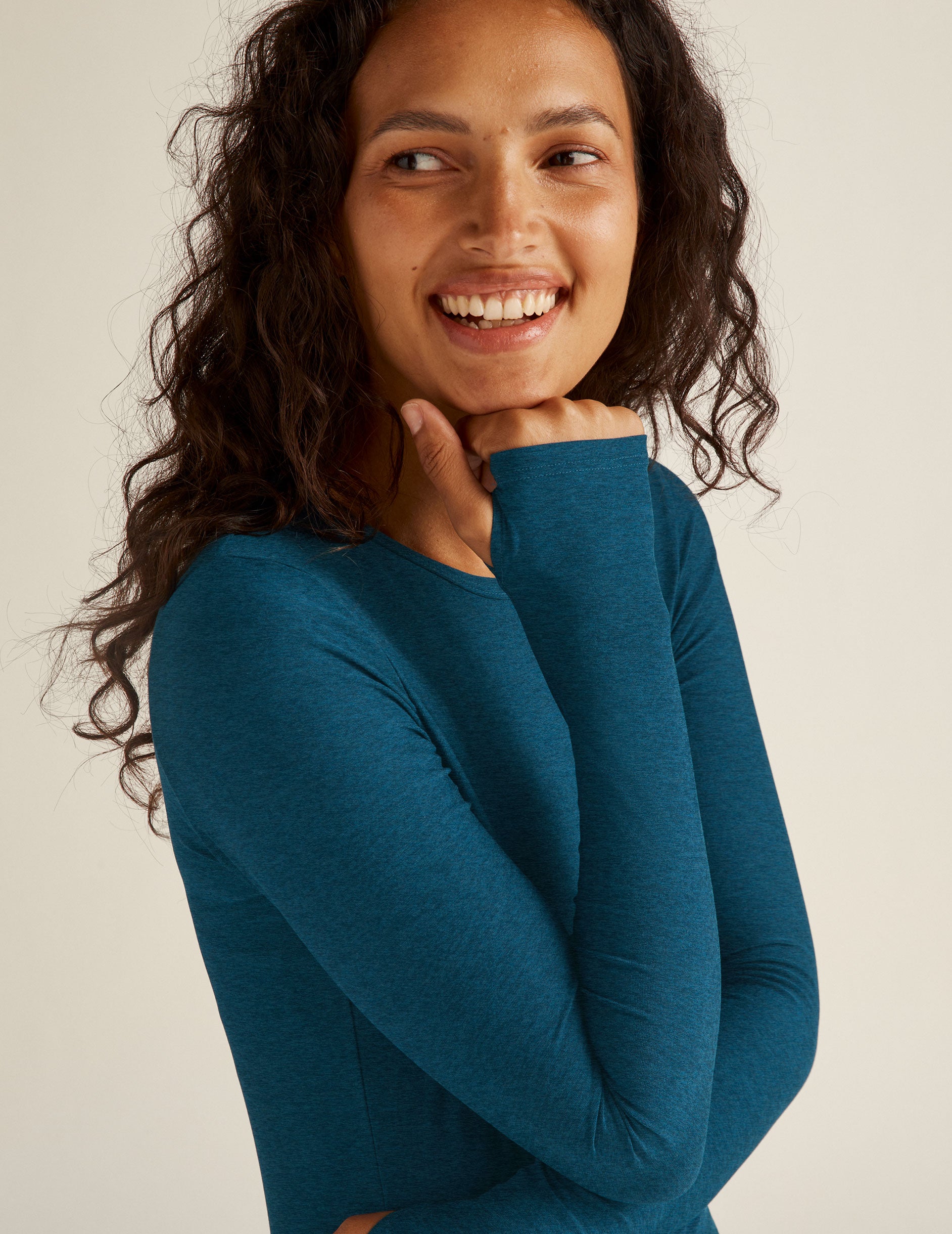 blue long sleeve pullover with thumb holes. 