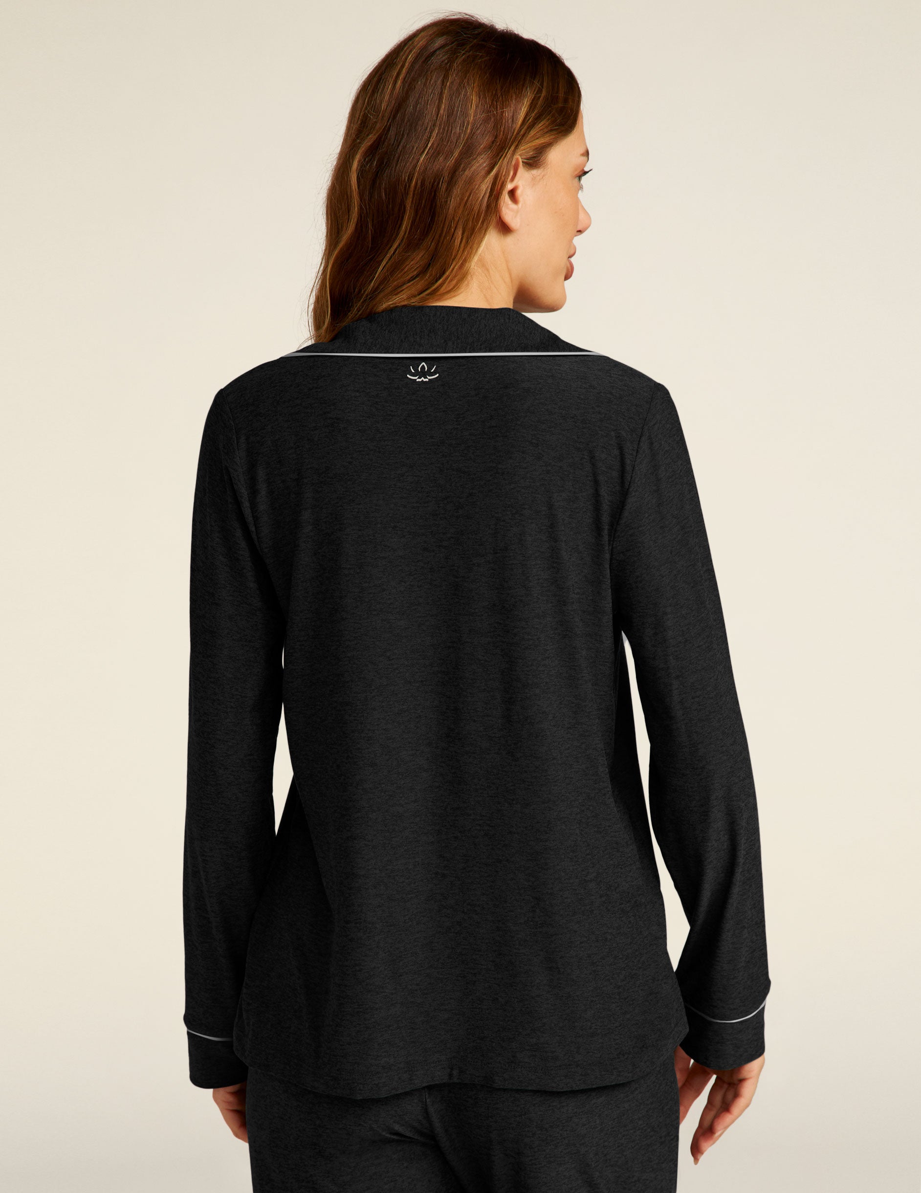 black long sleeve sleep top with white piping. 