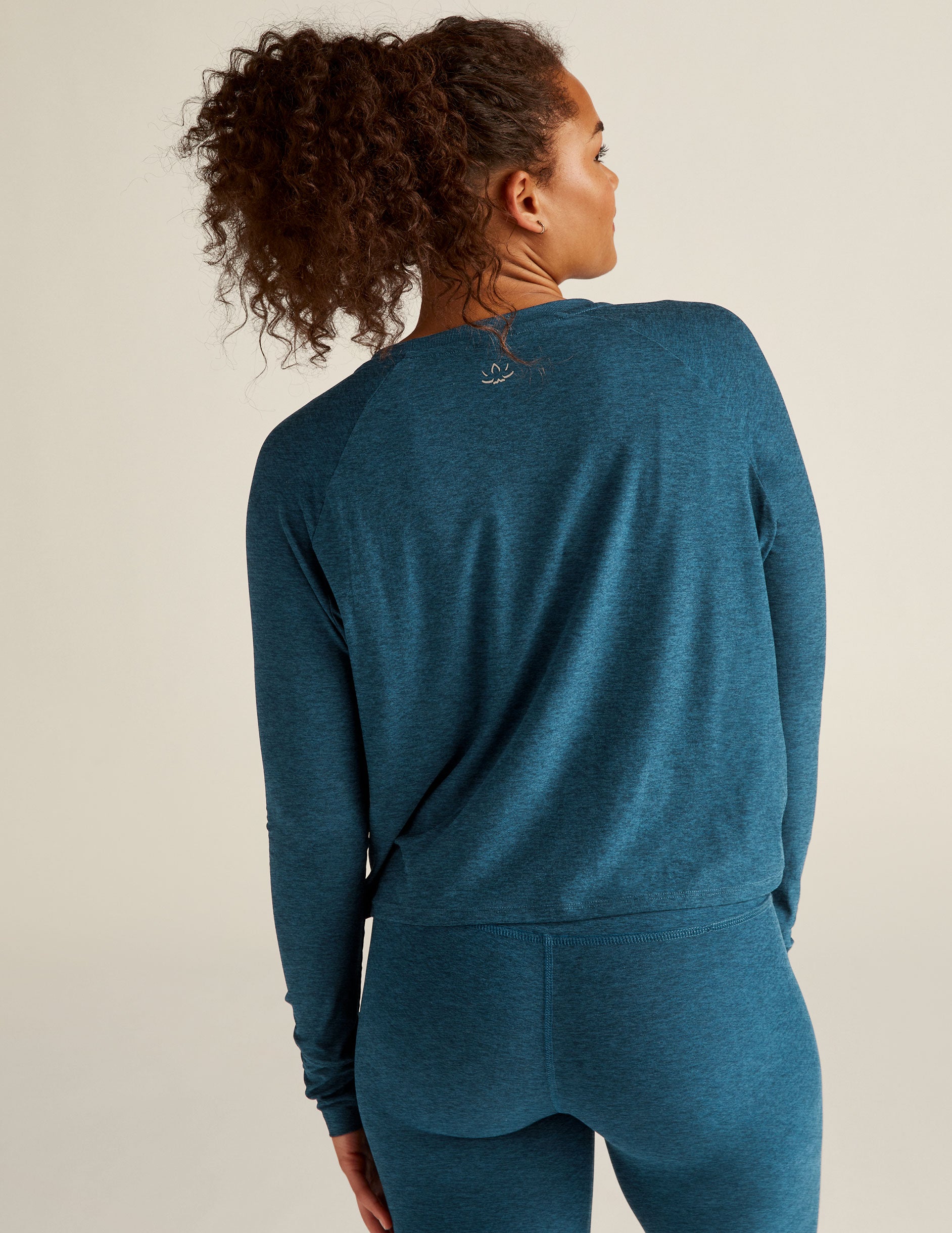 blue long sleeve pullover. 
