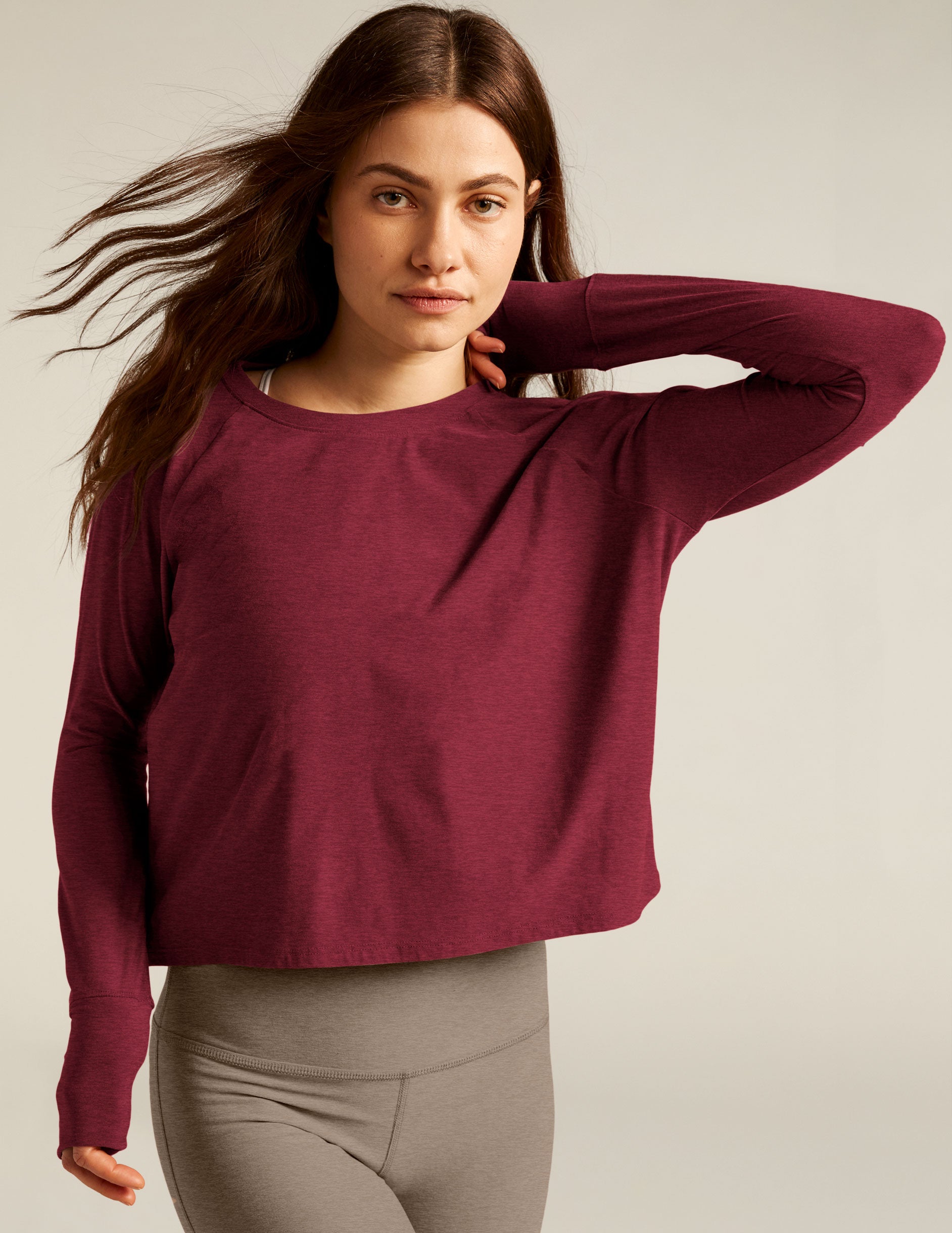 red scoop neck long sleeve lightweight top. 