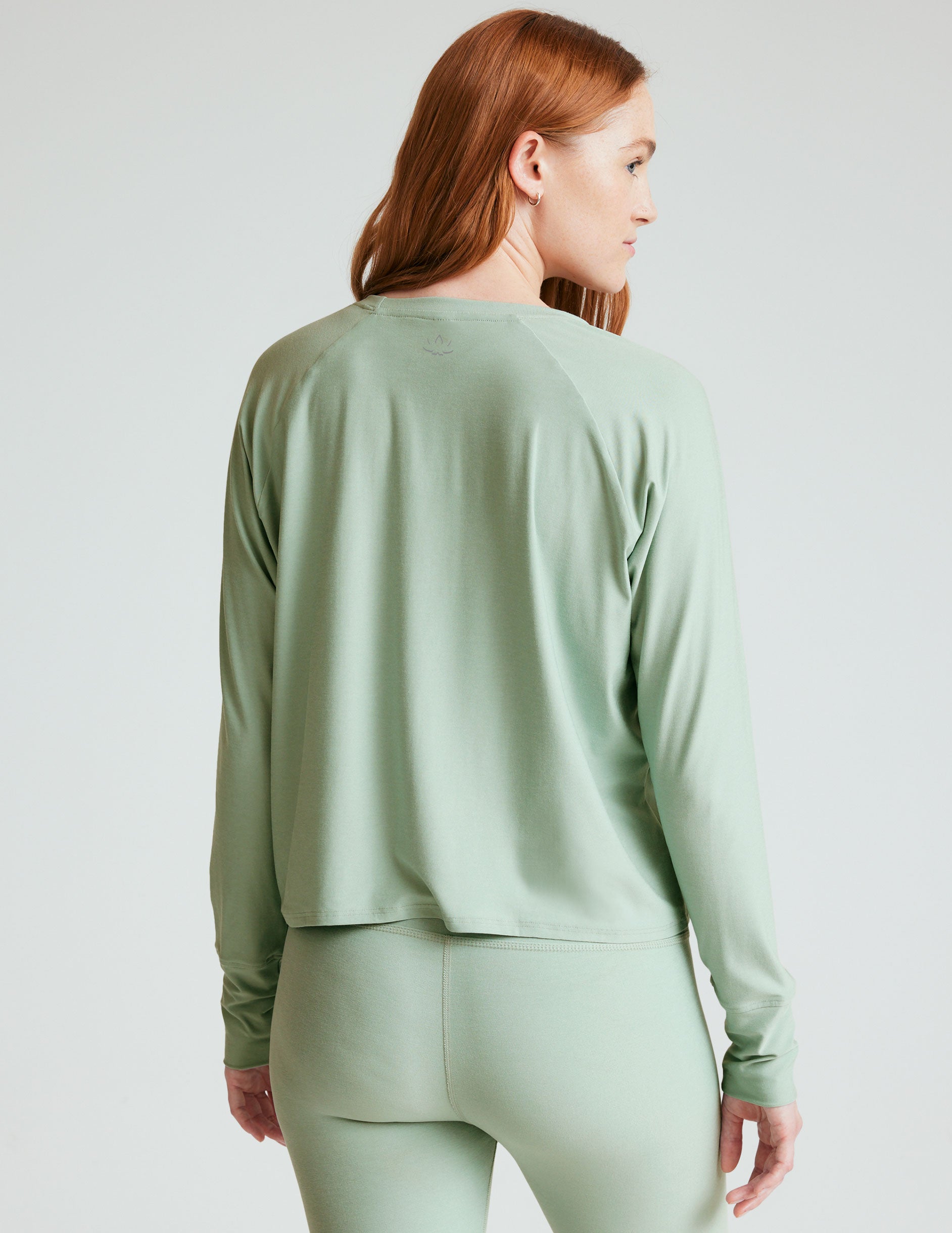 green long sleeve scoop neck top. 