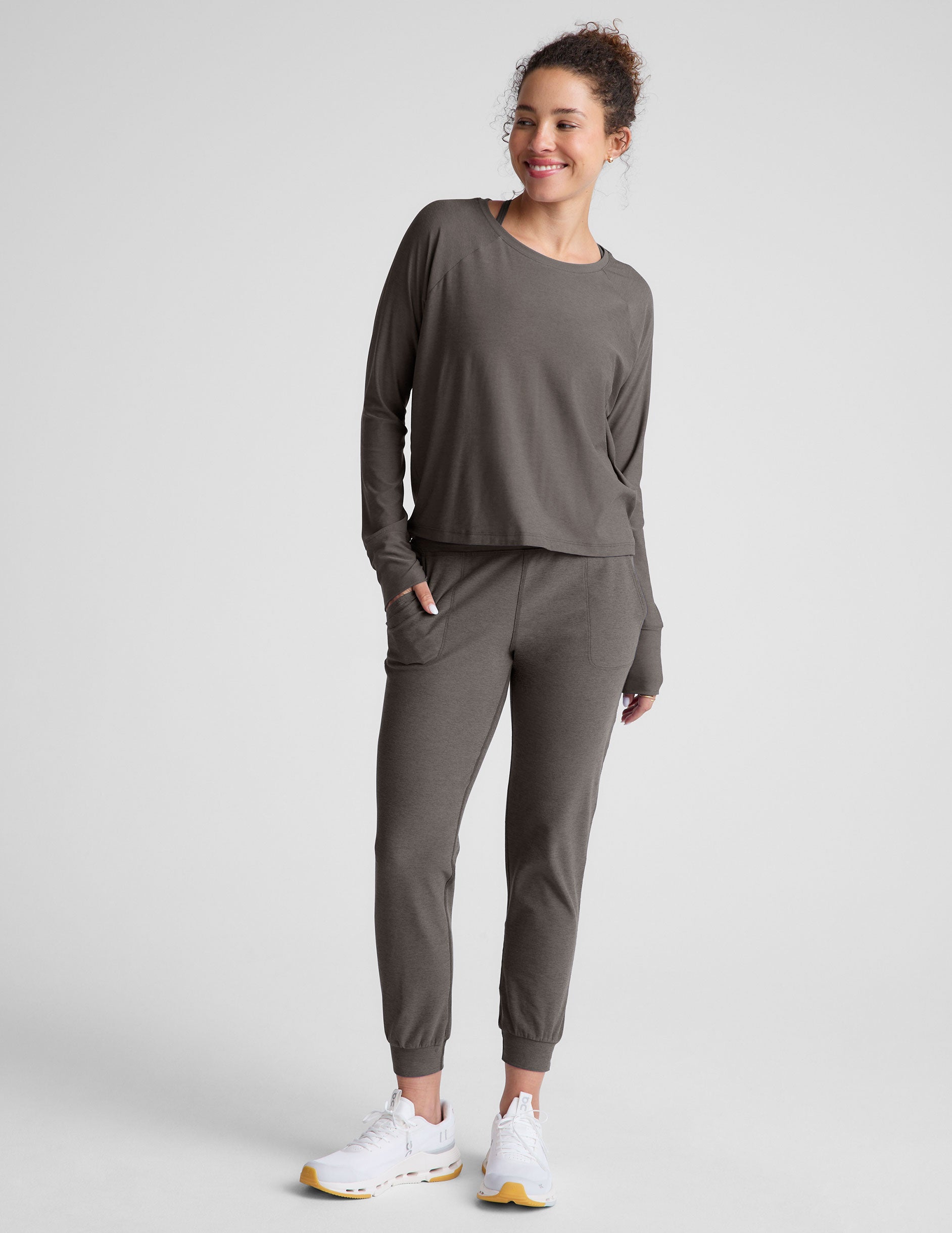 gray long sleeve lightweight top with a crew neckline. 