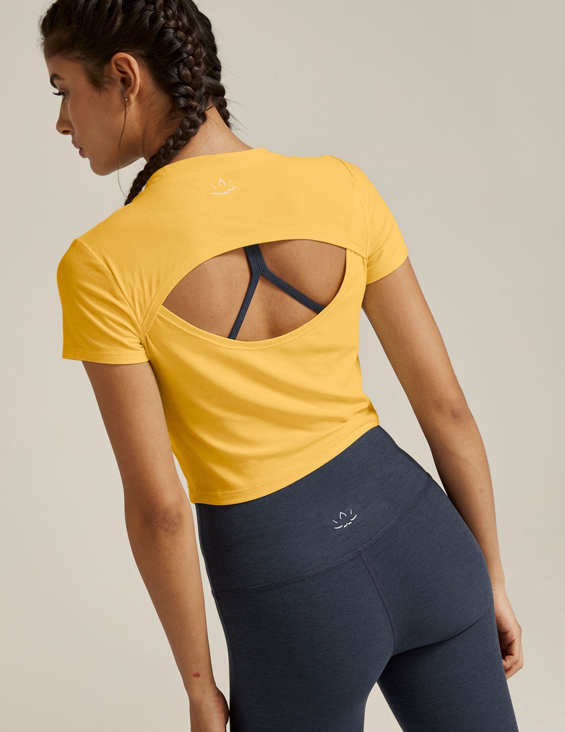 yellow fitted cropped t-shirt with a back keyhole opening. 