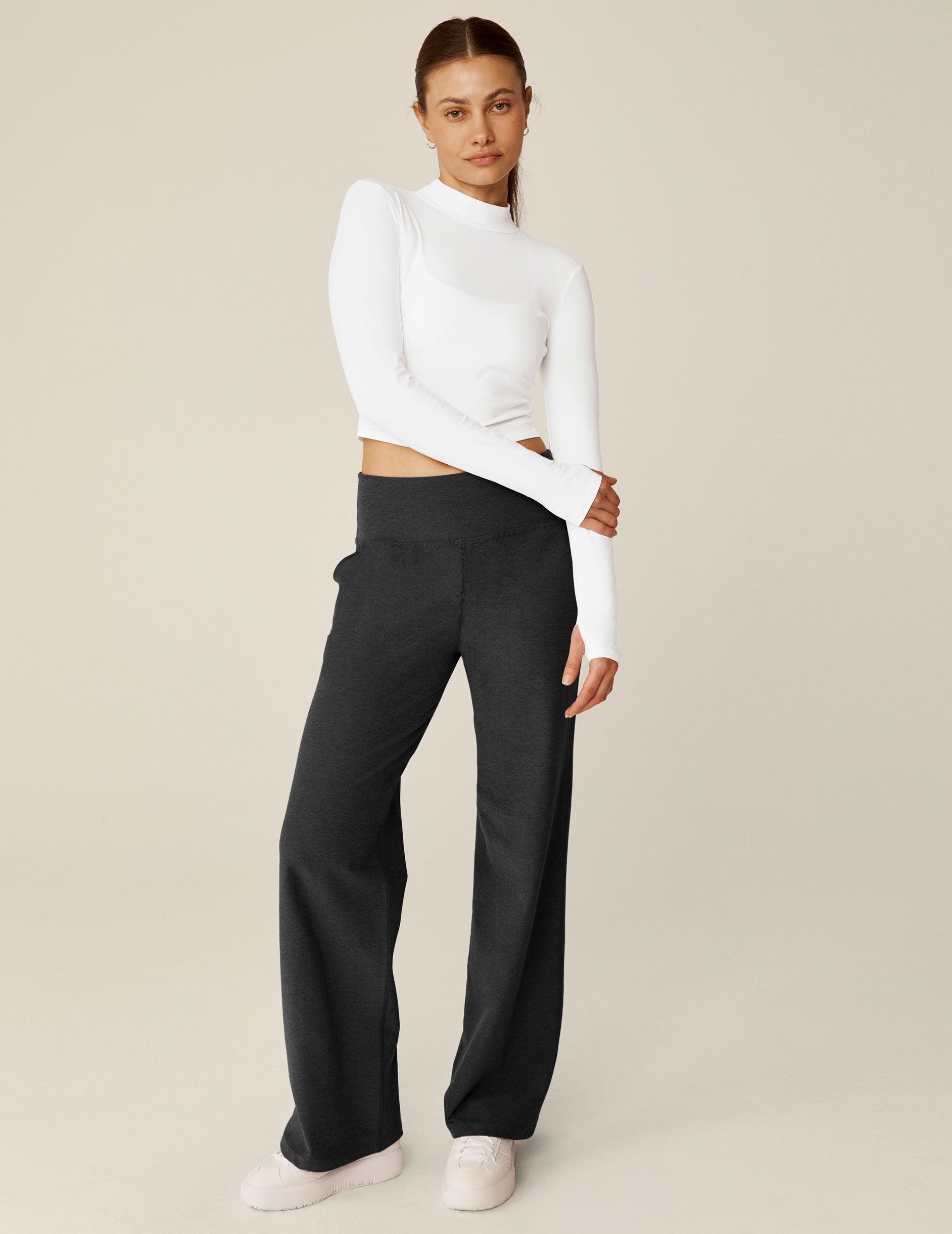 white cropped mock neck long sleeve with thumb holes. 