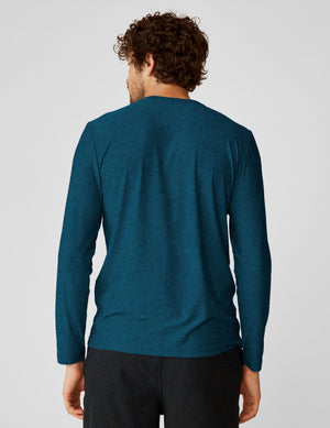 blue men's long sleeve crew neck top. 