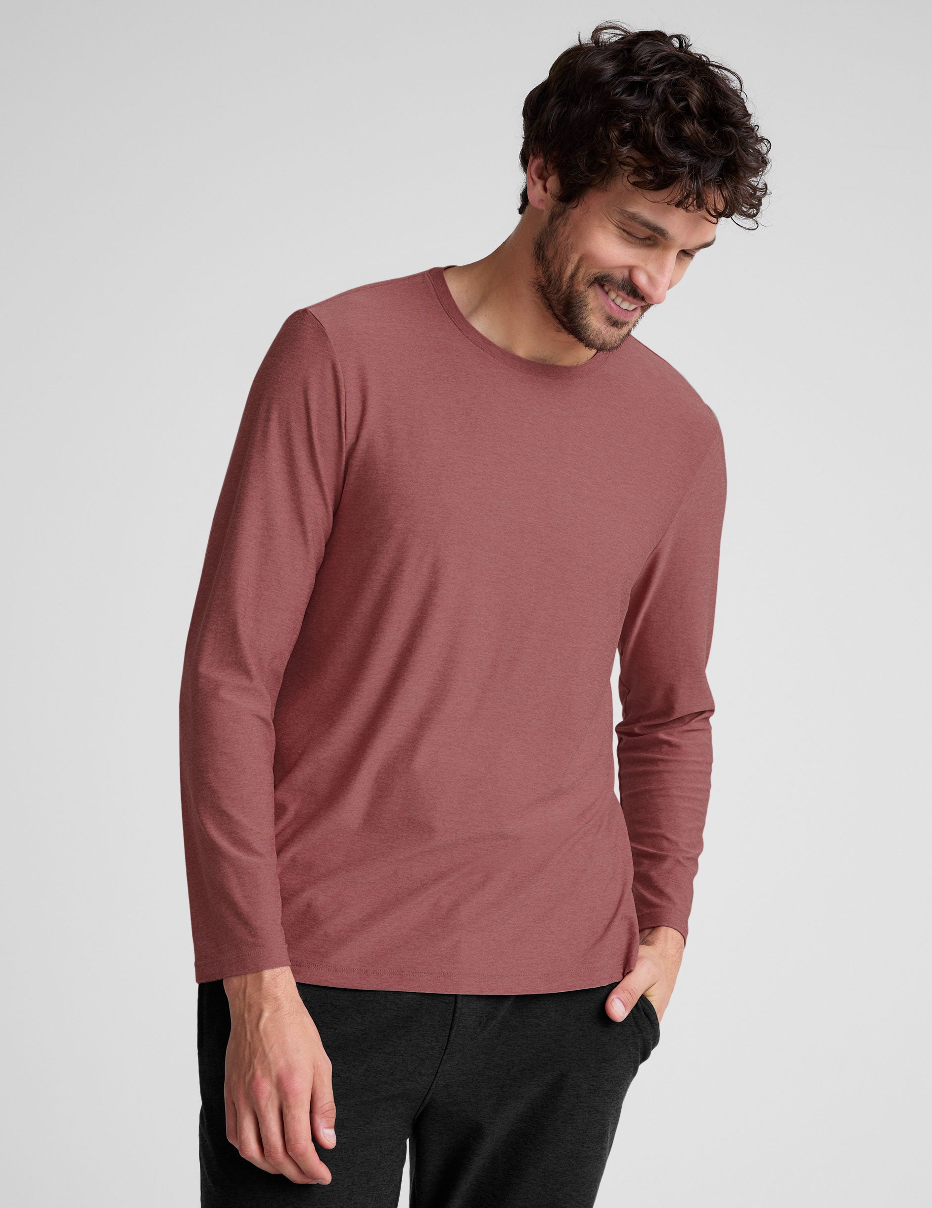 pink long sleeve crewneck top. 