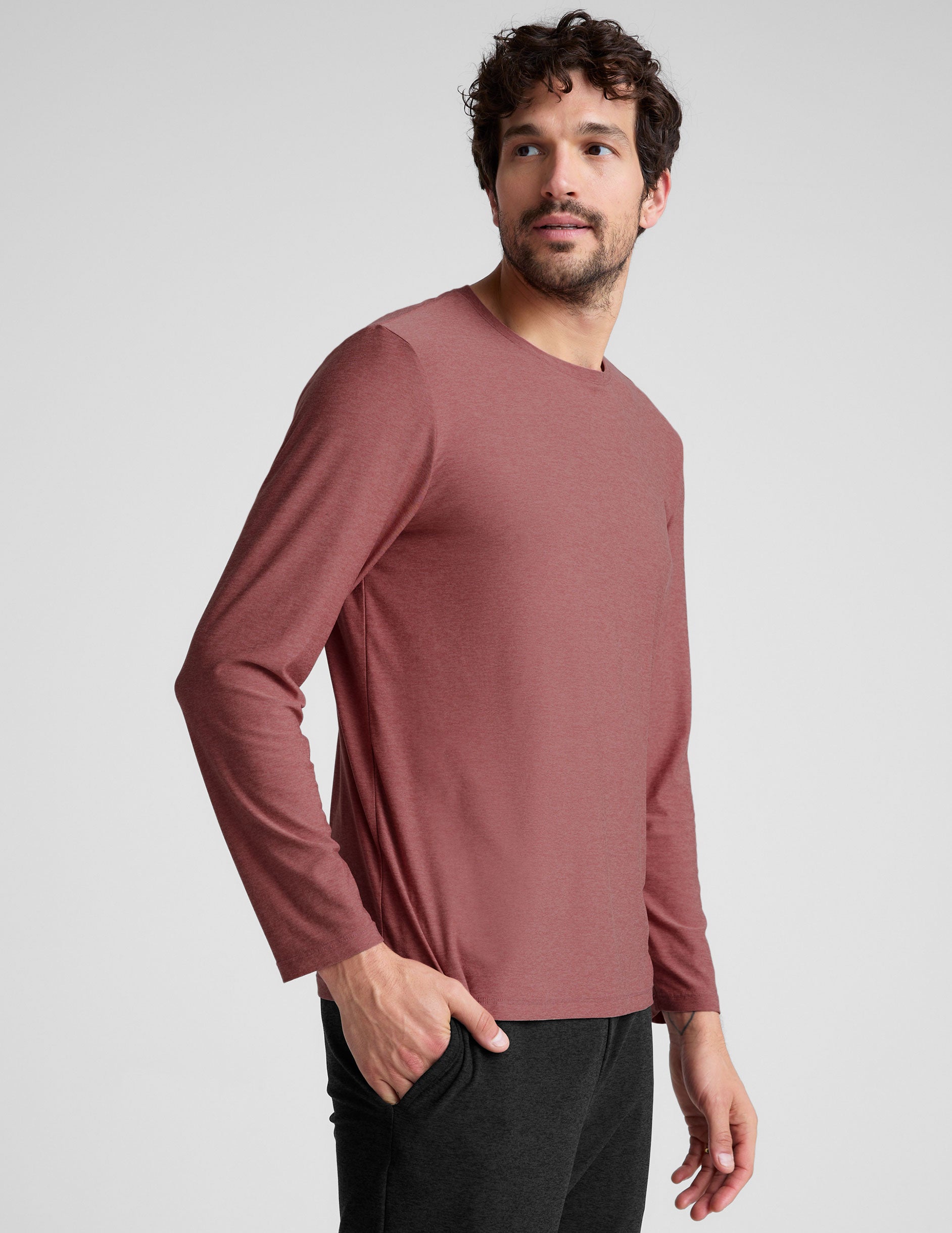 pink long sleeve crewneck top. 