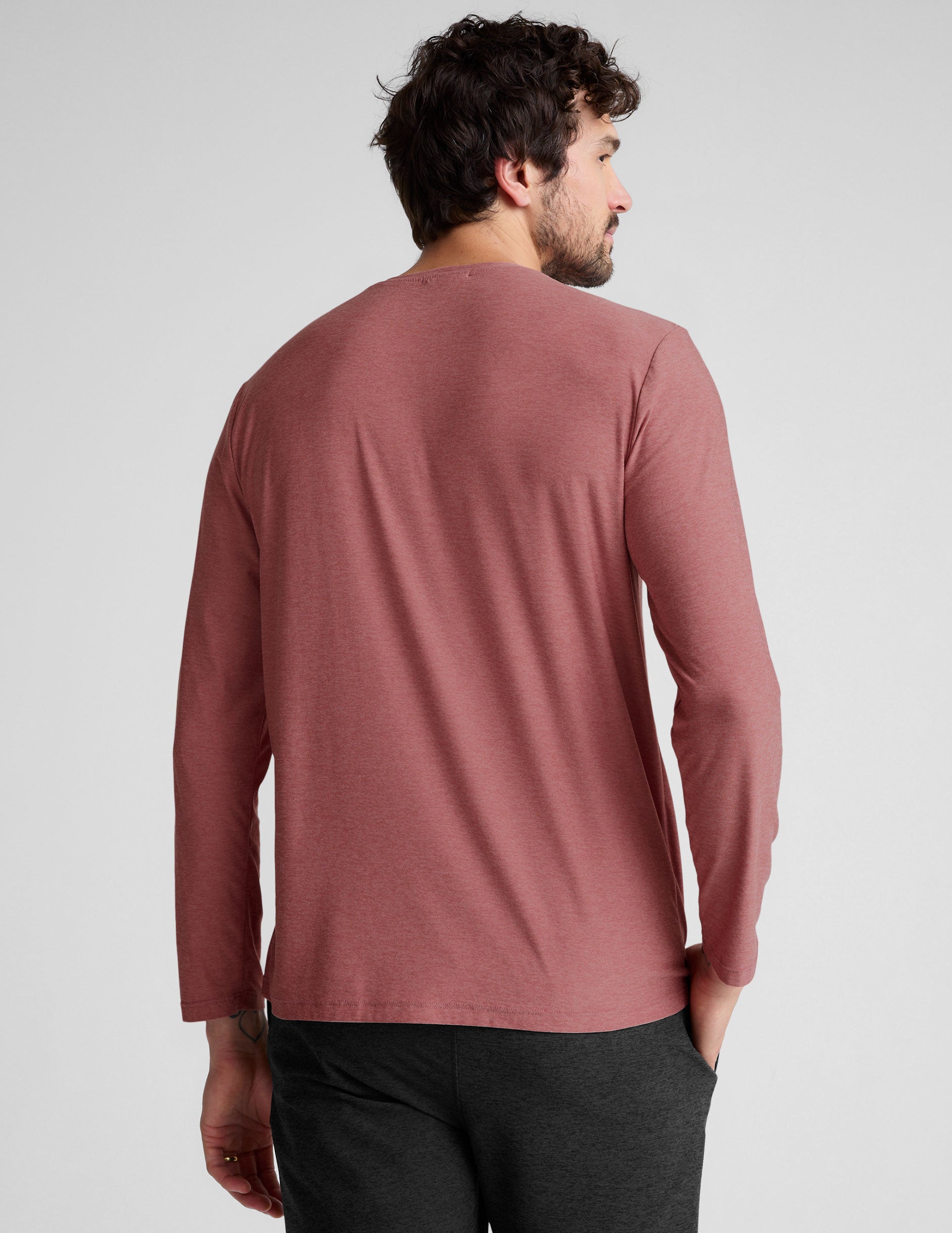 pink long sleeve crewneck top. 