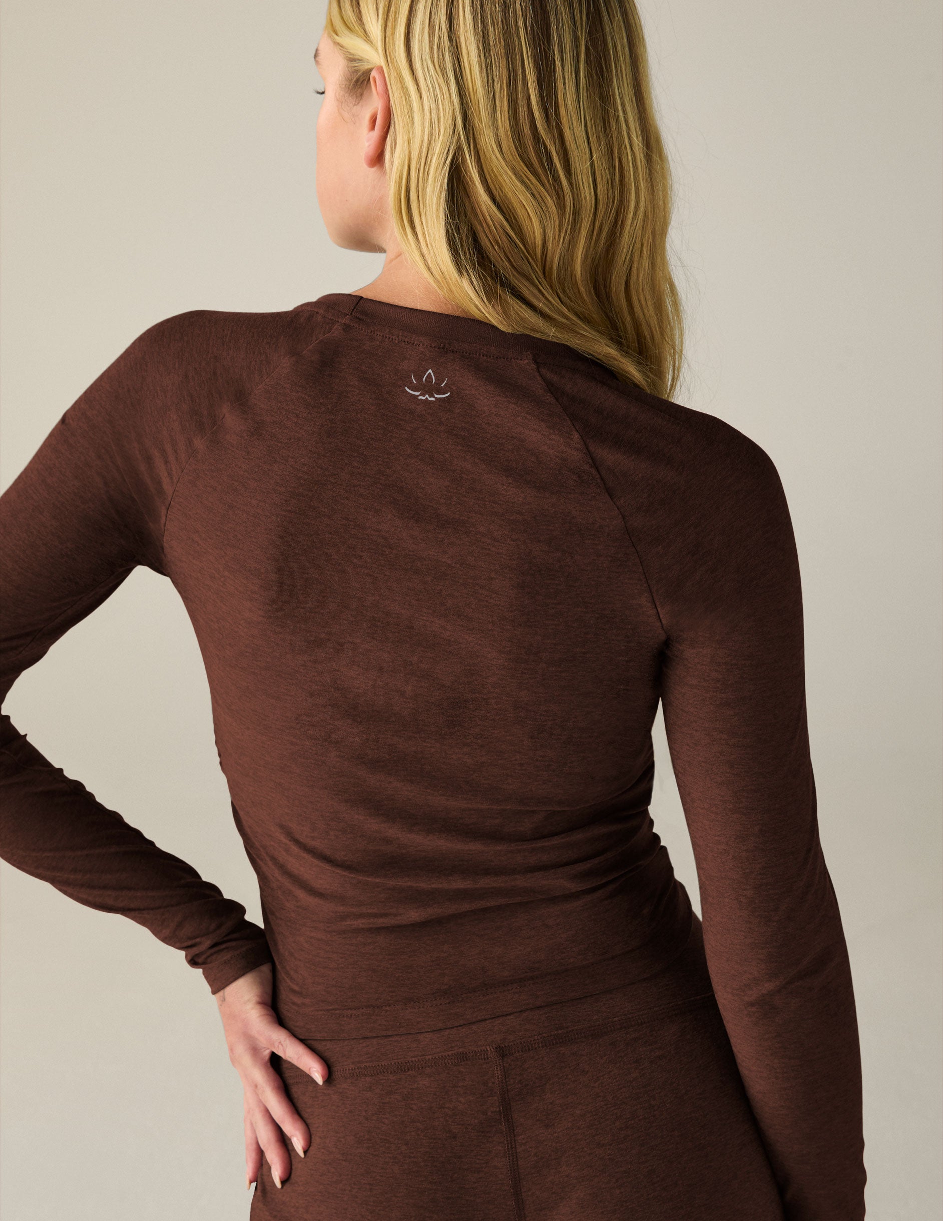 brown long sleeve top.