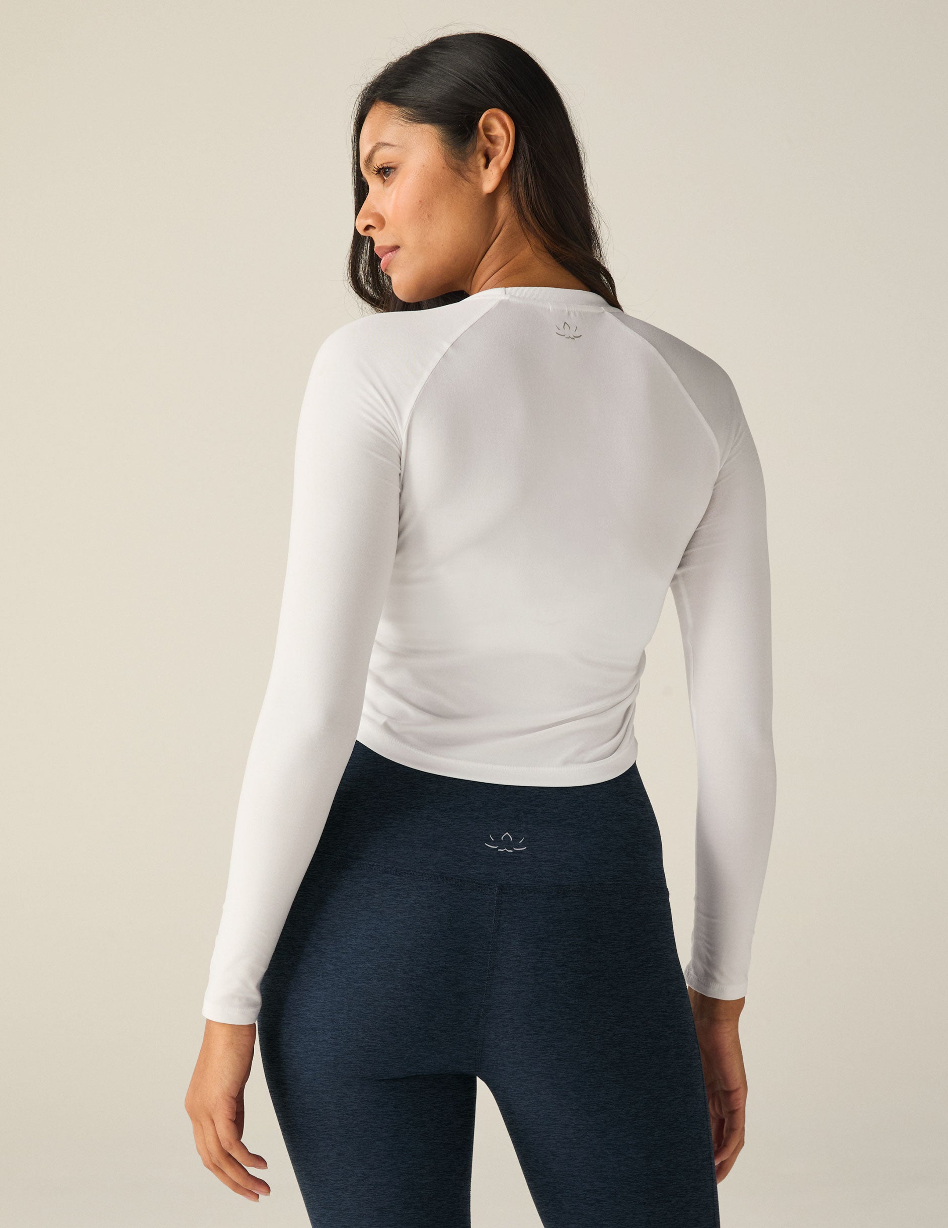 white long sleeve top.