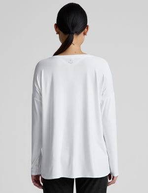 white long sleeve crew neck maternity top. 
