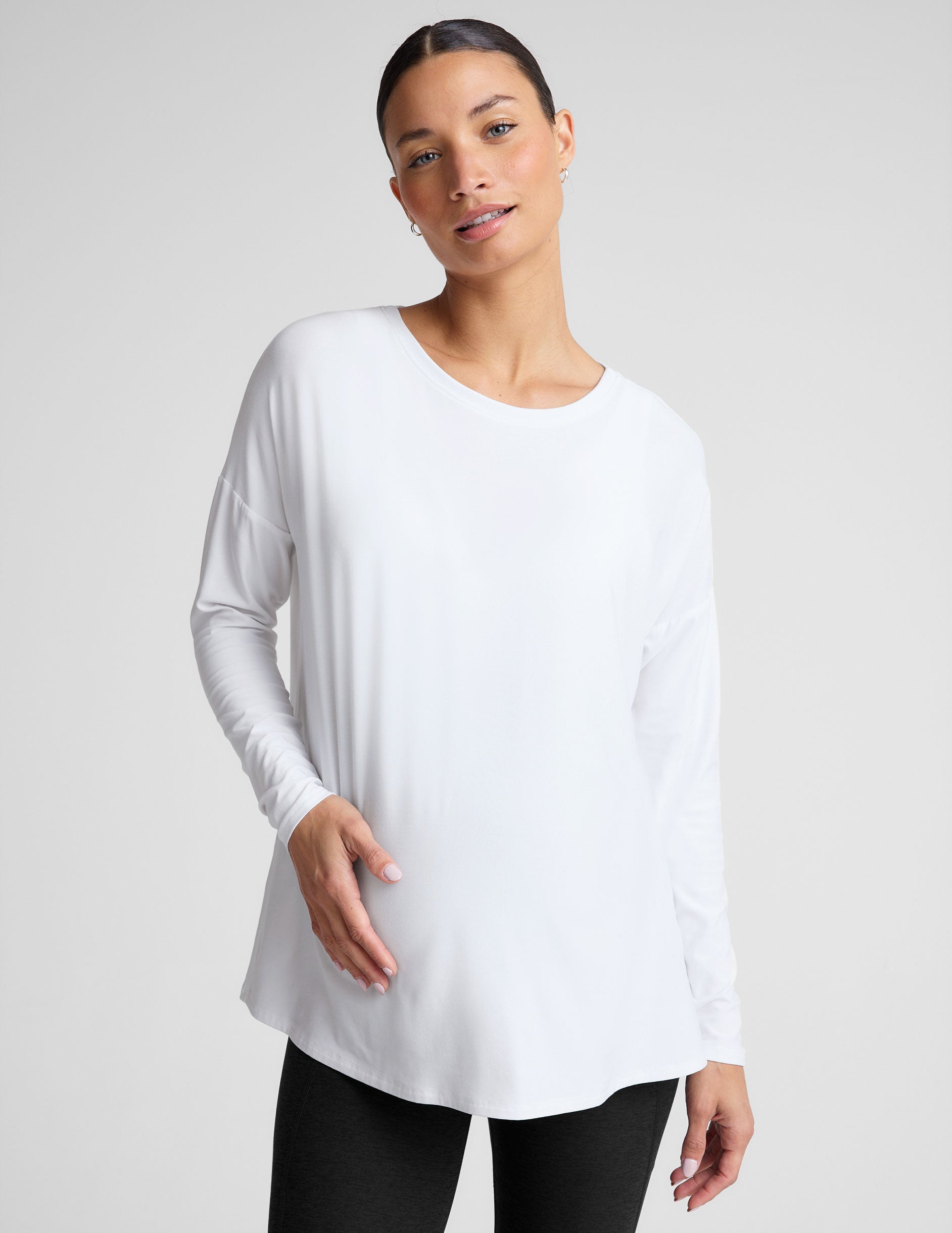 white long sleeve crew neck maternity top. 