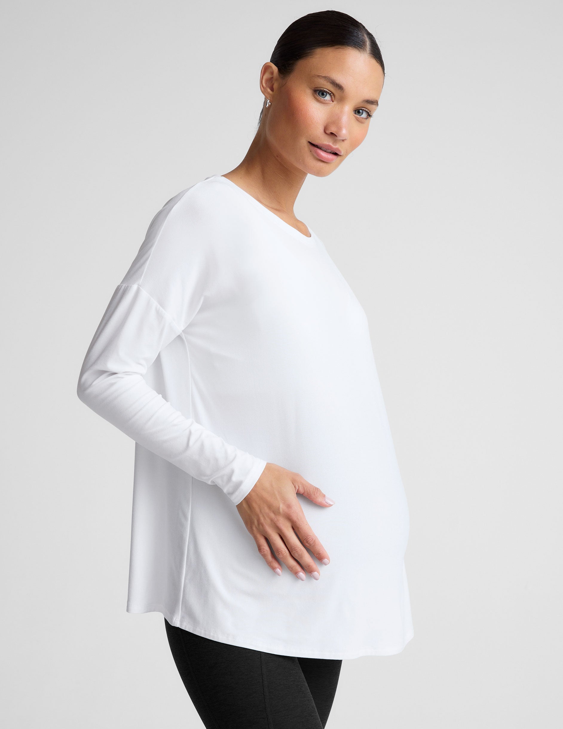 white long sleeve crew neck maternity top. 