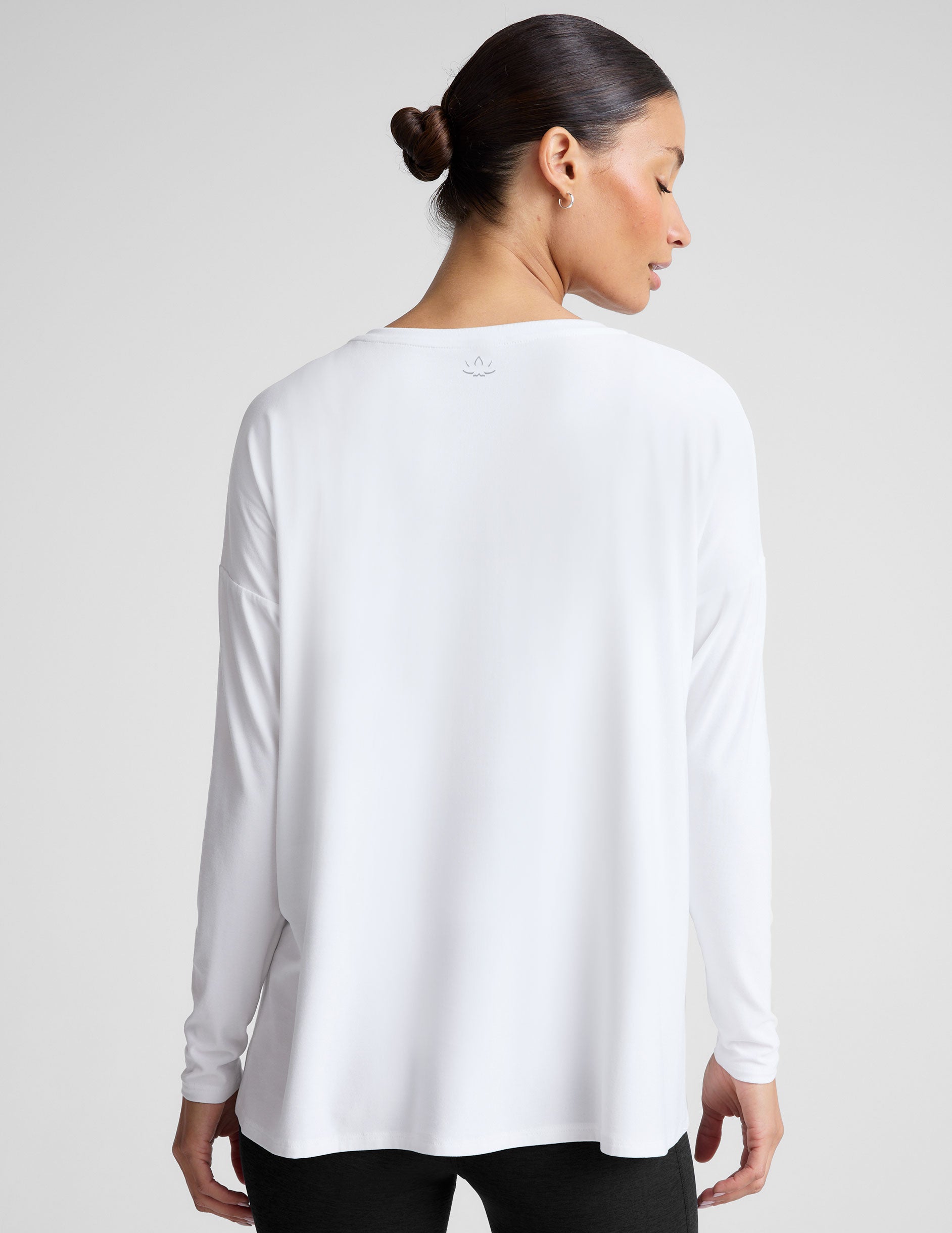 white long sleeve crew neck maternity top. 