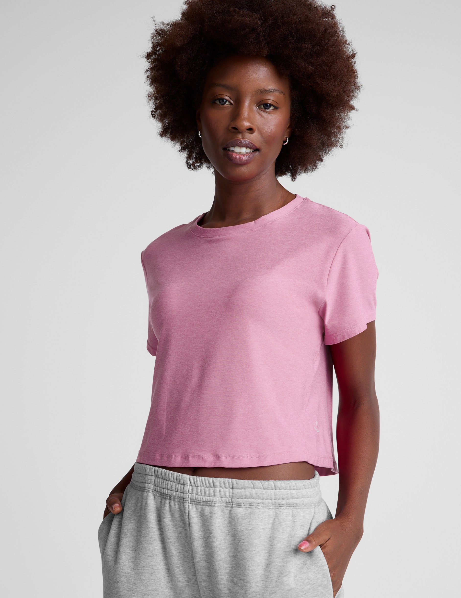 pink cropped short sleeve tee with a scoop neck. 