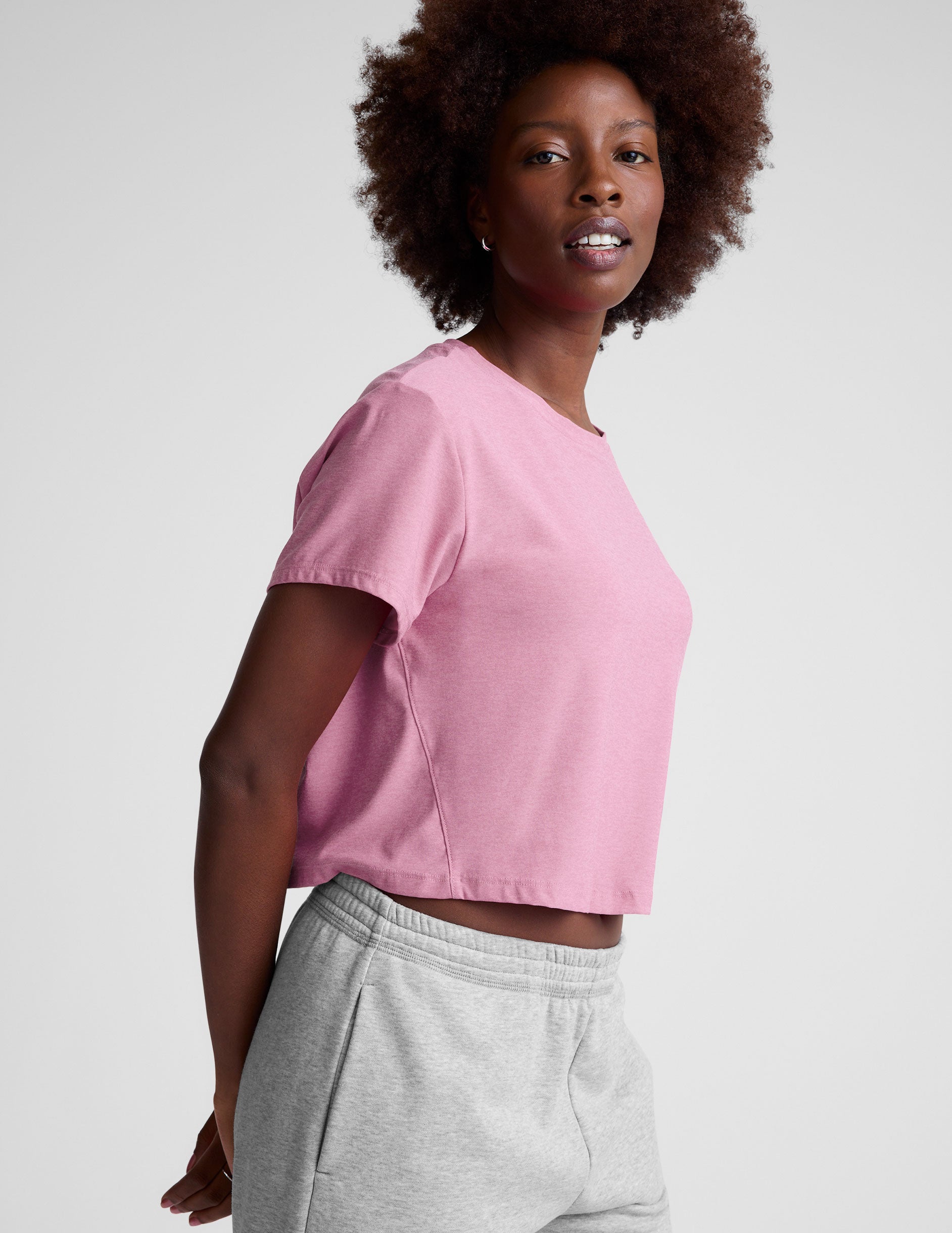 pink cropped short sleeve tee with a scoop neck. 