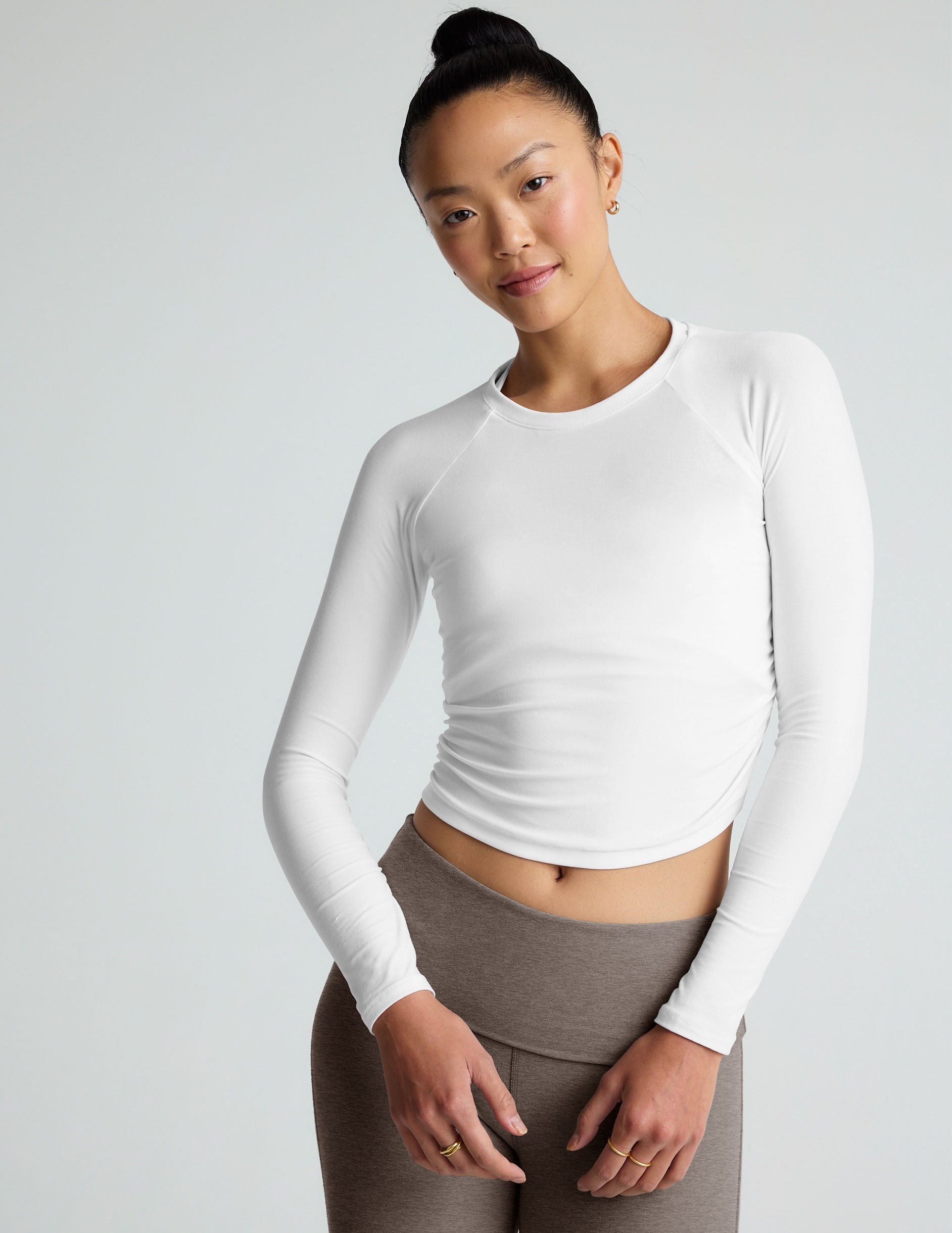 white long sleeve top.