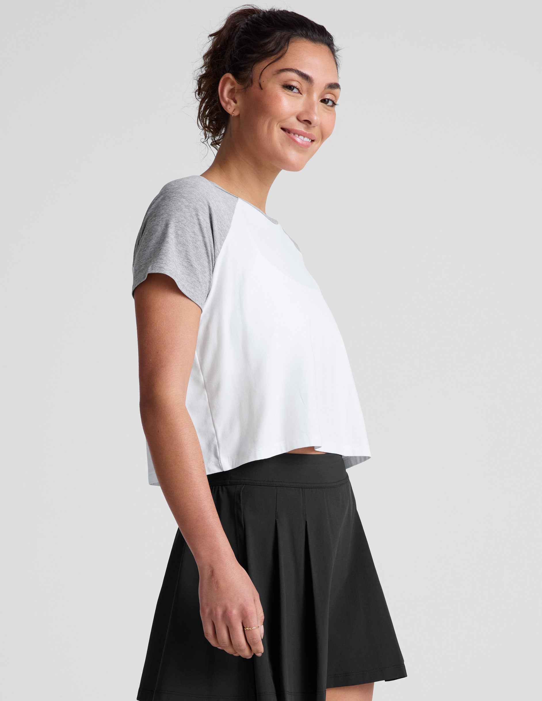 white relaxed fit t-shirt with colorblock raglan sleeve and neck binding​.