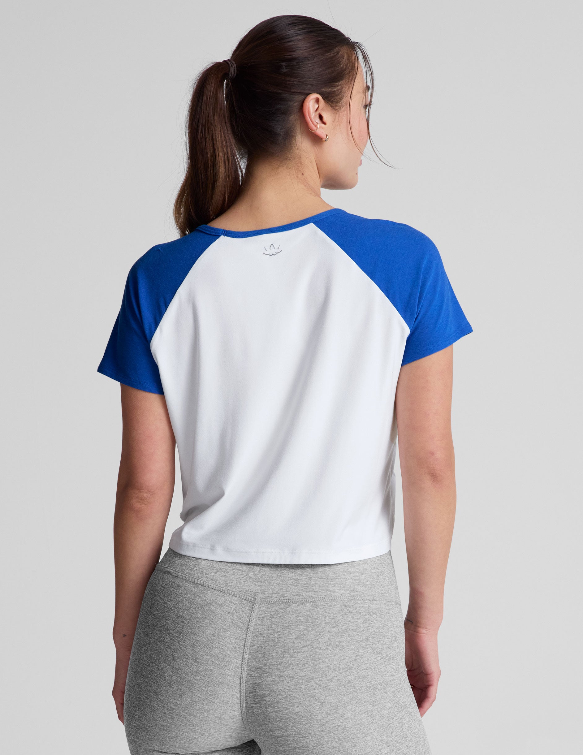 white short sleeve top with blue sleeves