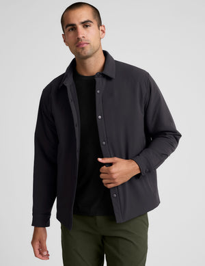 black men's button up insulated jacket with a shirt collar and side seam invisible zipper pockets. 