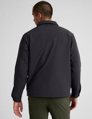 black men's button up insulated jacket with a shirt collar and side seam invisible zipper pockets. 