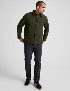 green men's button up insulated jacket with a shirt collar and side seam invisible zipper pockets. 
