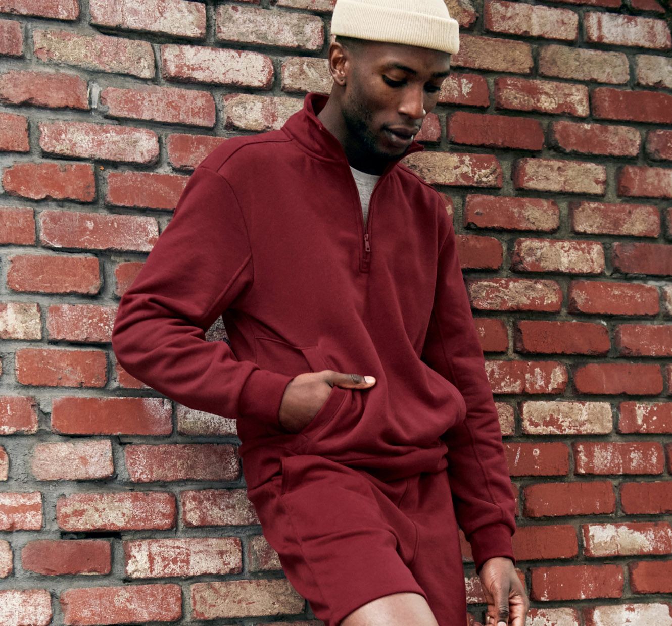 red mens pullover with red shorts