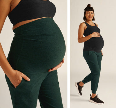 model is wearing green maternity jogger pants. 