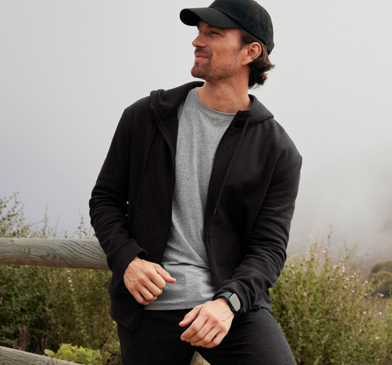 men black zip up hoodie paired with mens short sleeve gray shirt