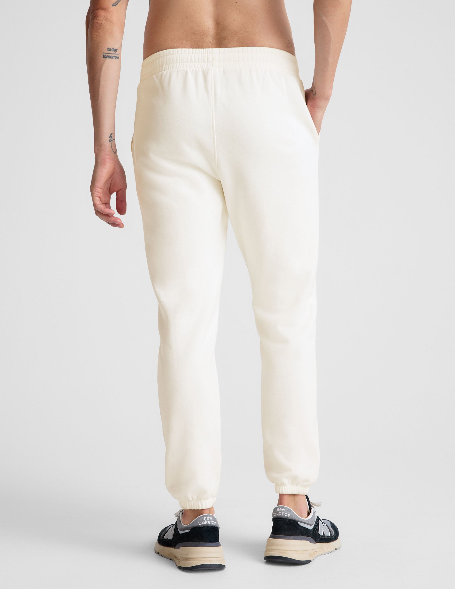 white men's sweatpants with a drawstring at waistband.