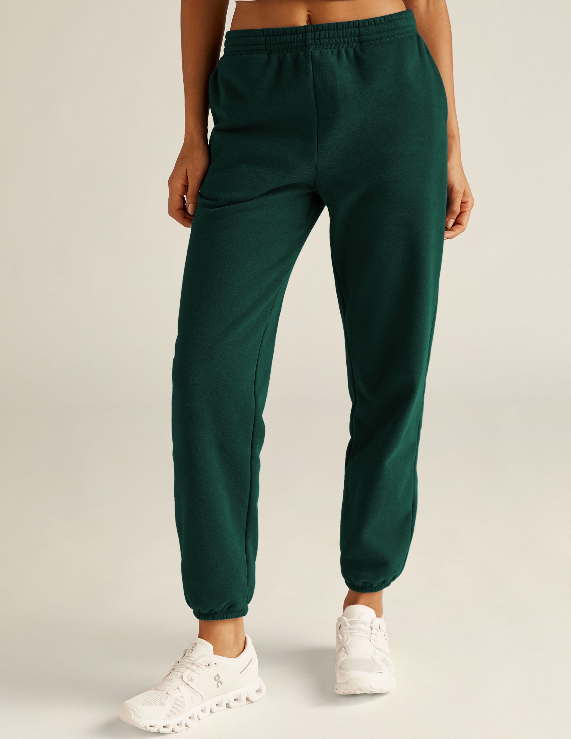 green jogger sweatpants with pockets. 