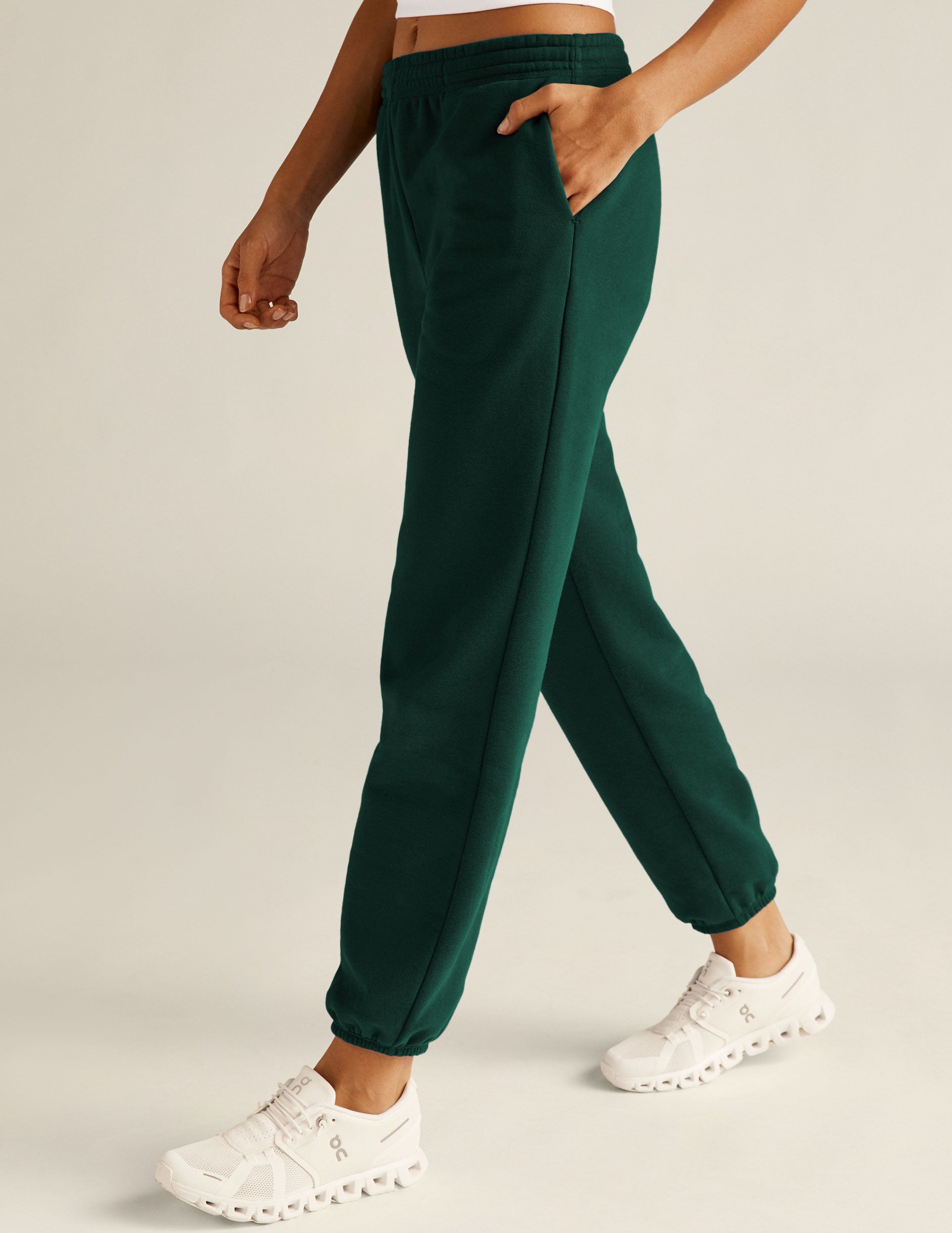 green jogger sweatpants with pockets. 