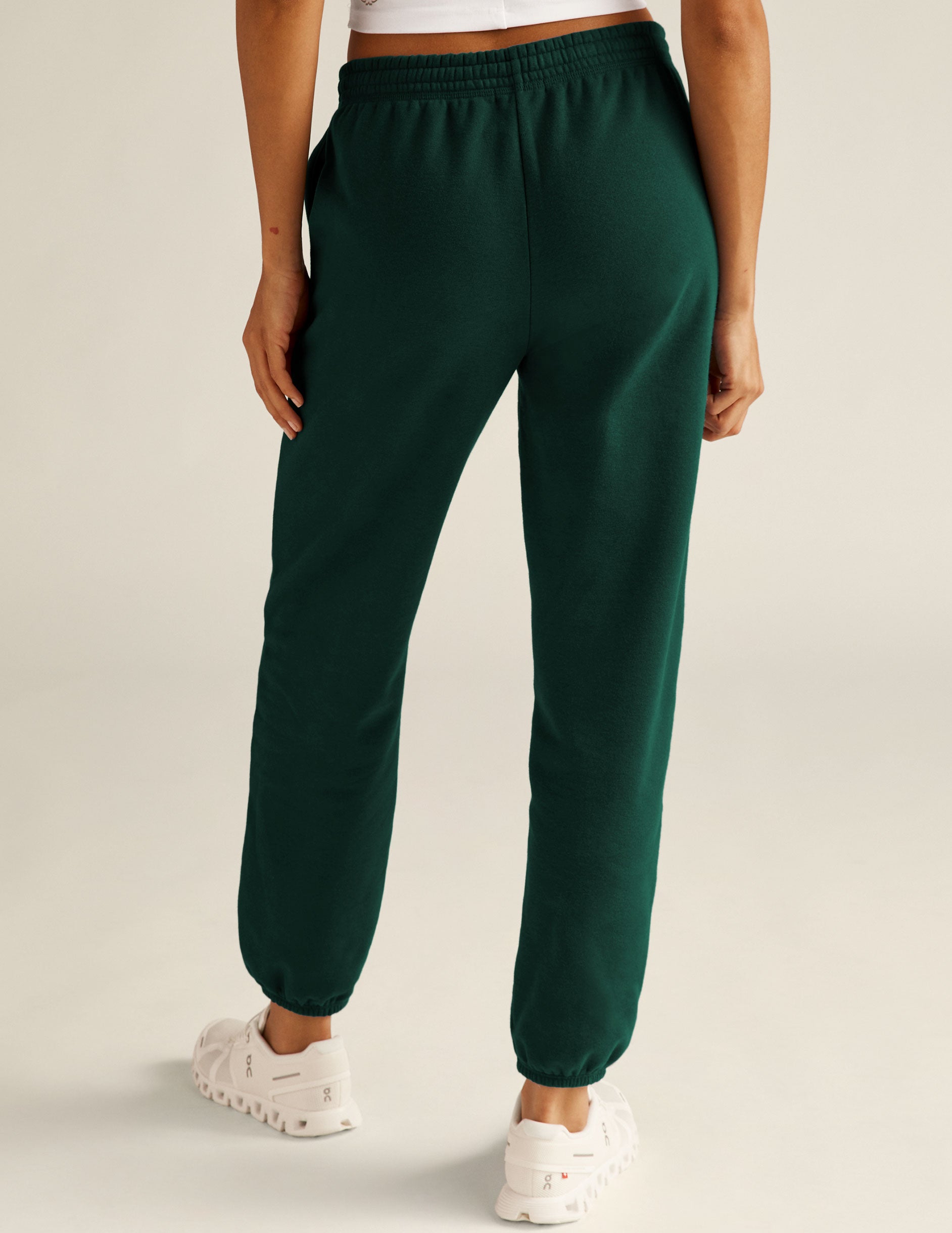 green jogger sweatpants with pockets. 