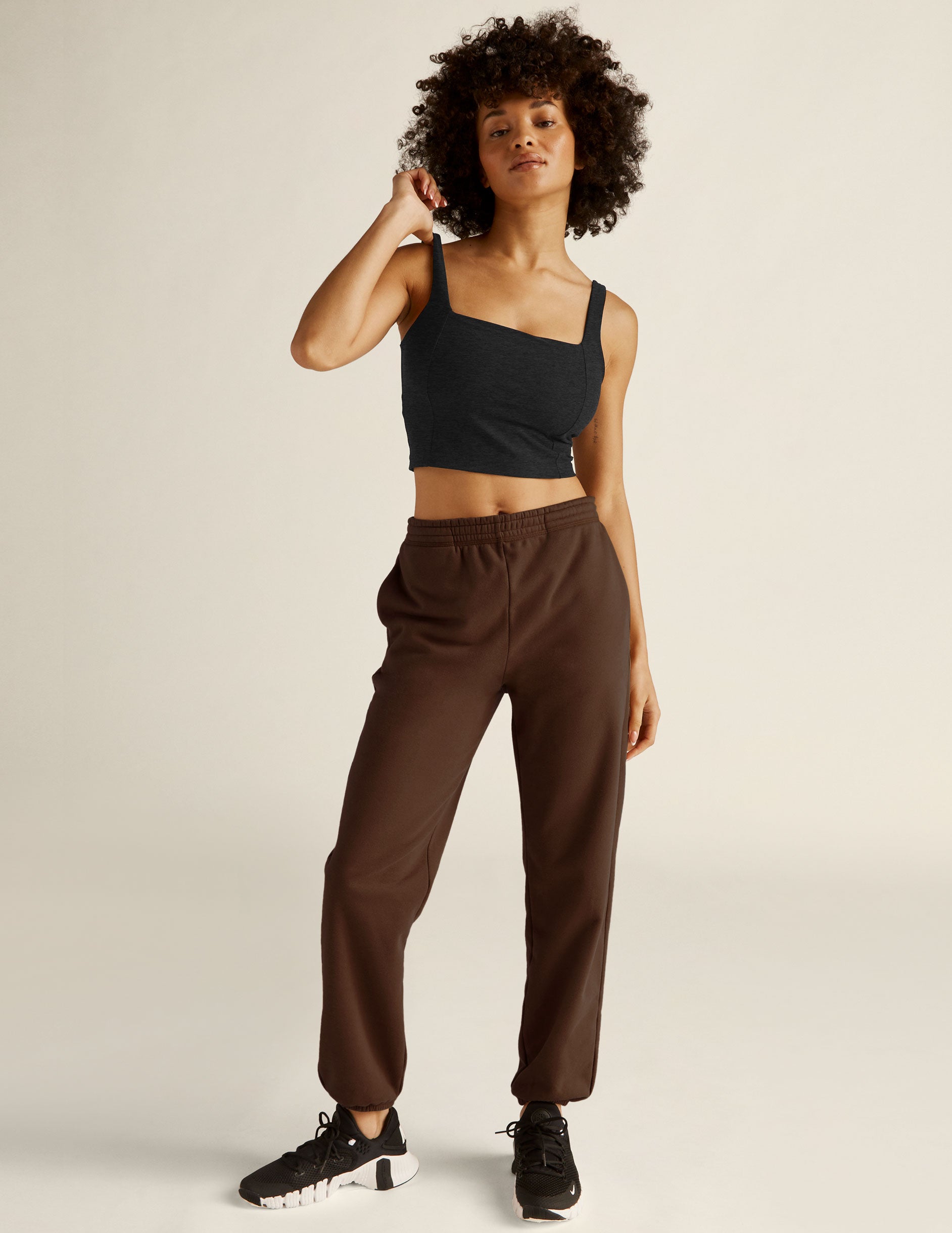 brown jogger style sweatpants with pockets. 