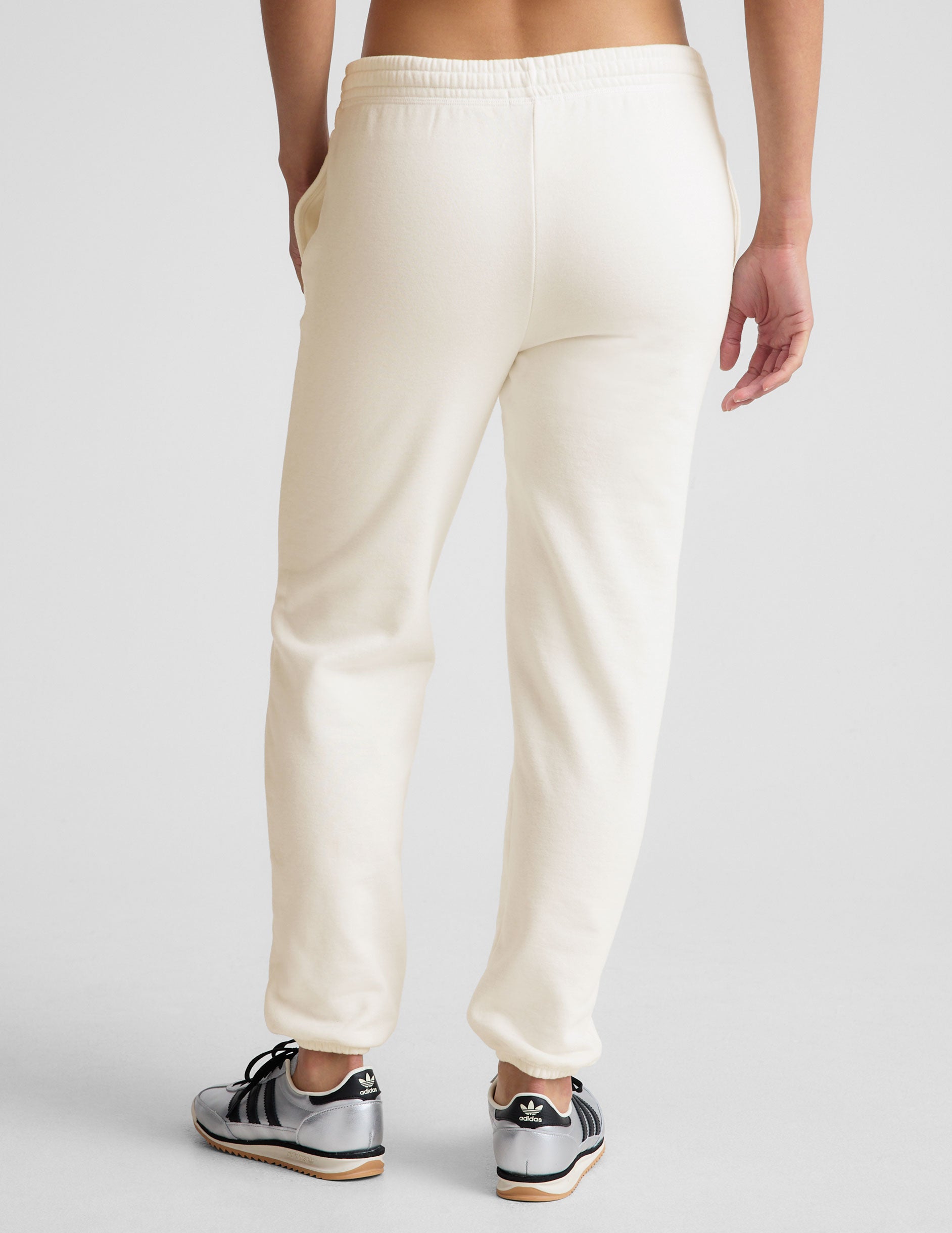 white joggers with pockets. 