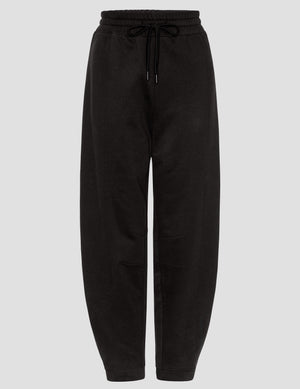 black fleece barrel style sweatpants against a plain background. 