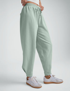 Sage green LuxeFleece Barrel Sweatpant featuring an elastic drawstring waist, curved barrel leg, and cuffed ankles.