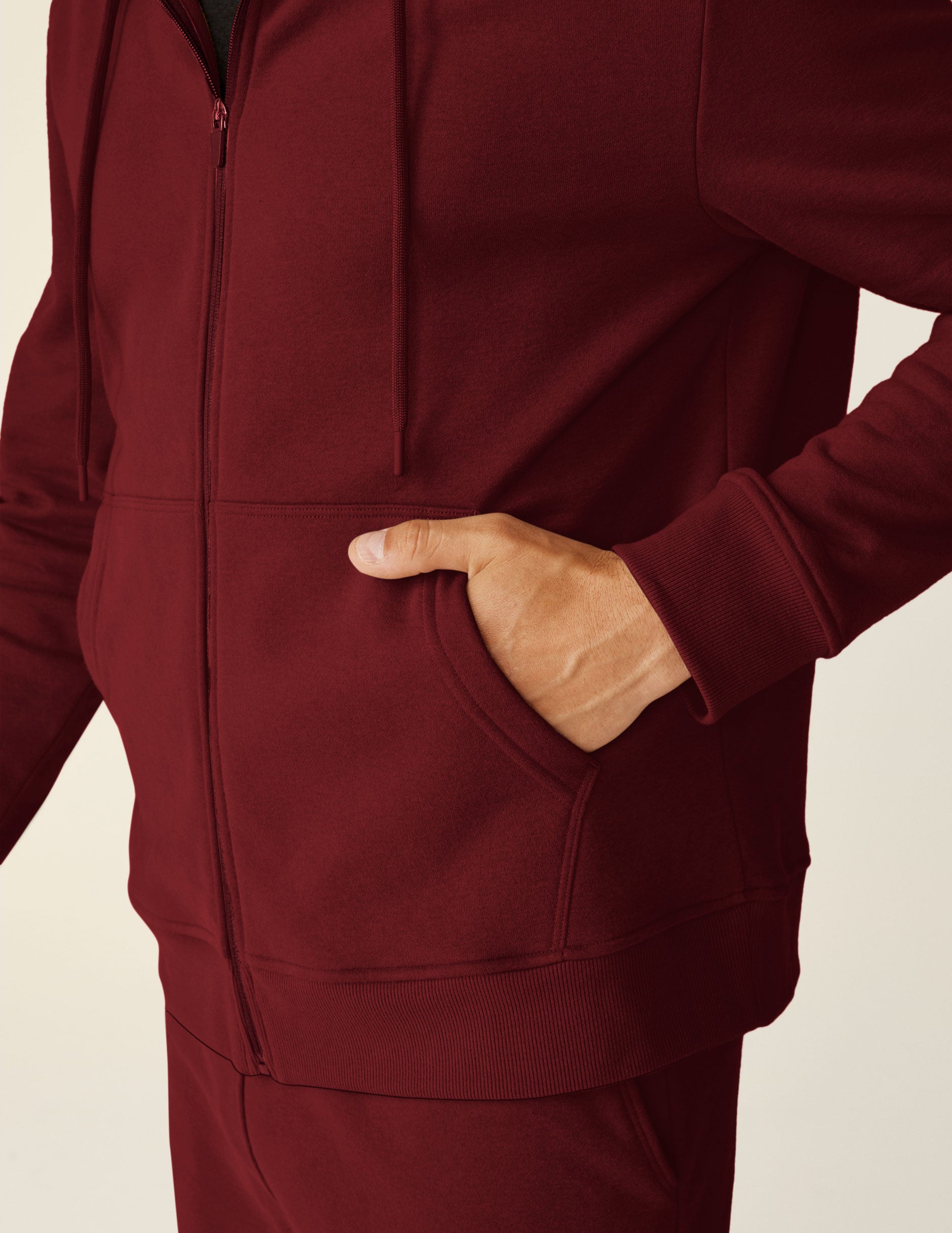 red men's zip-up hooded jacket with pockets. 