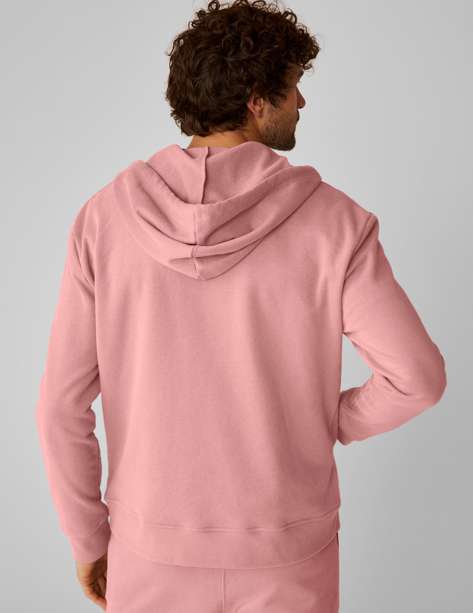 pink men's zip-up hooded jacket. 