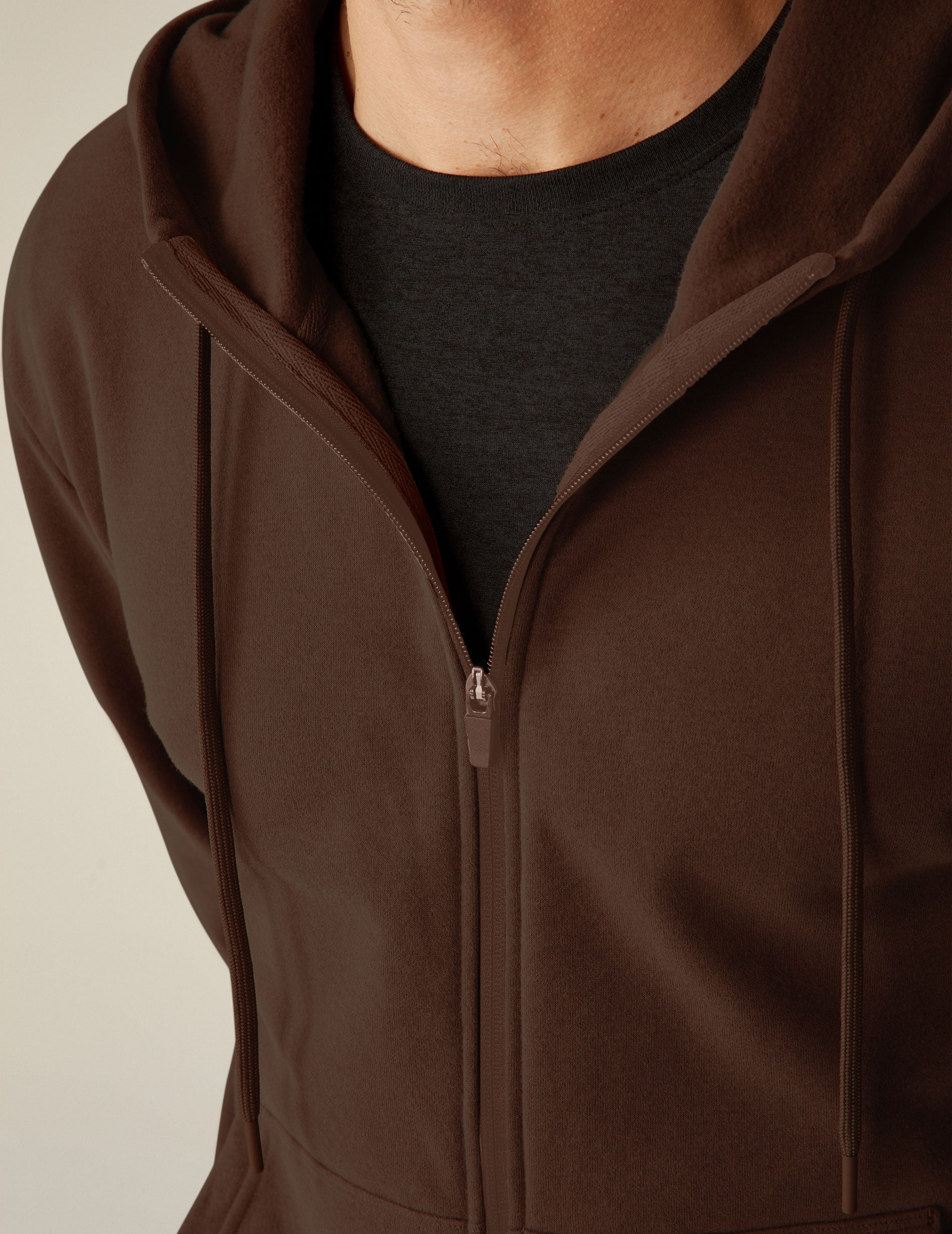 brown zip-up jacket with pockets and a hood. 